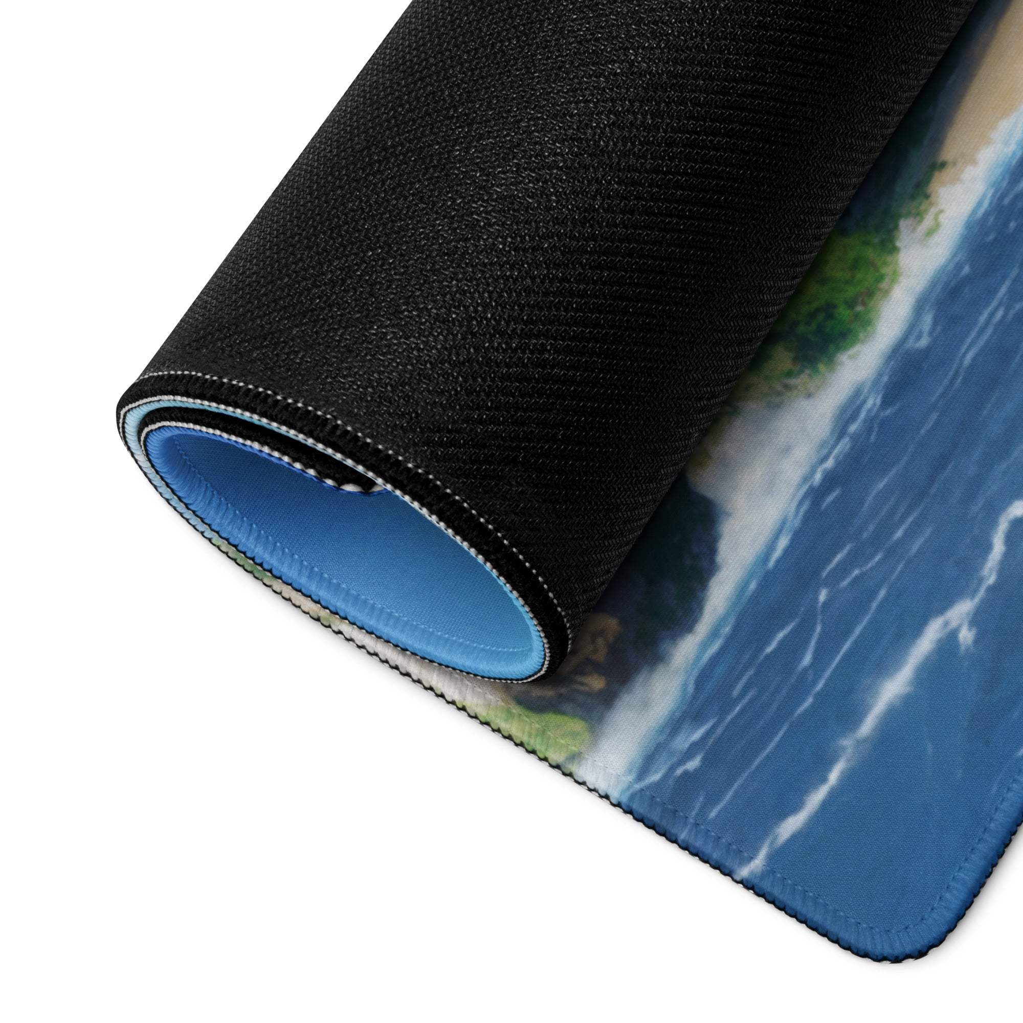 Black and blue ocean island gaming mousepad with textured surface