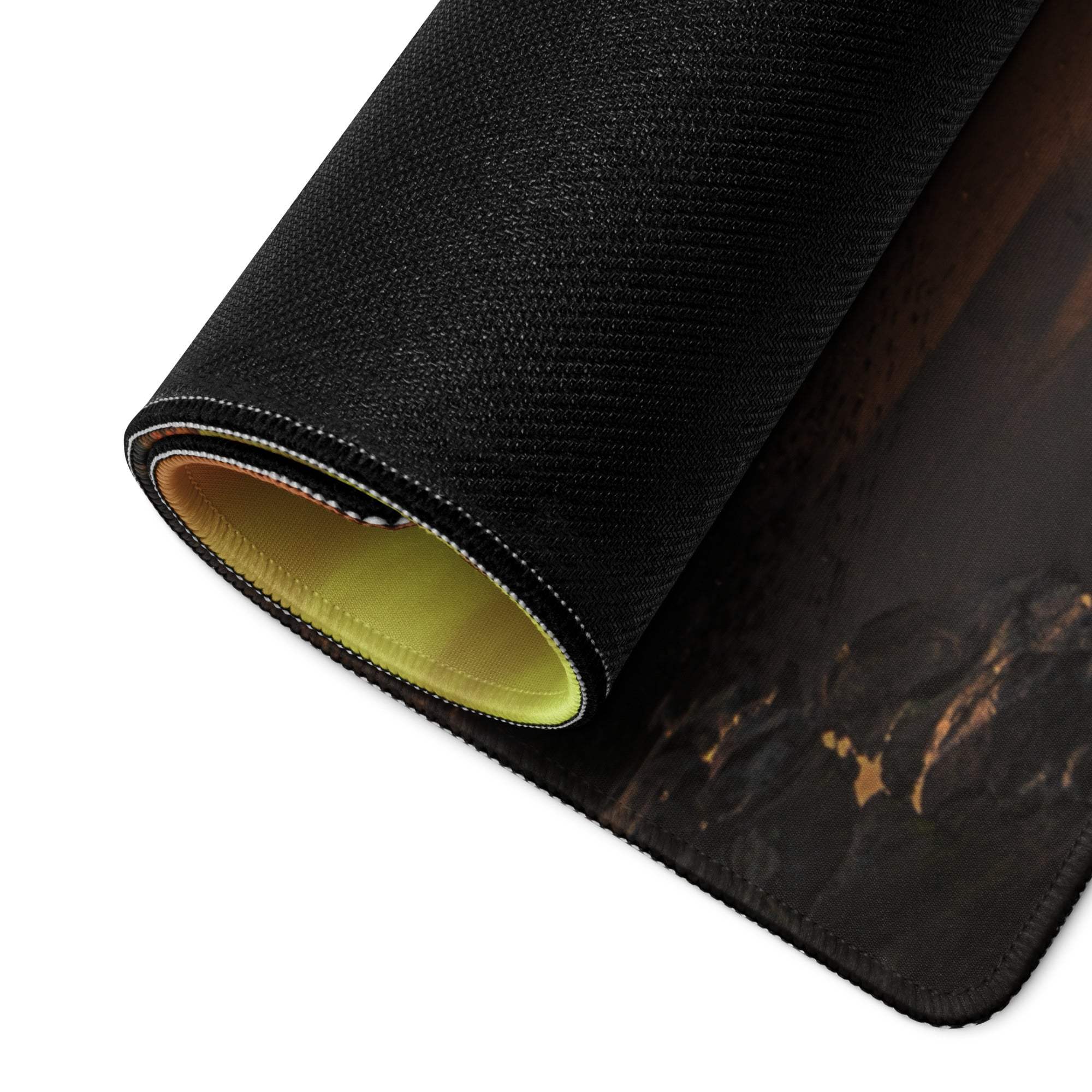 Black textured gaming mousepad with marbled design, yellow lining, non-slip base