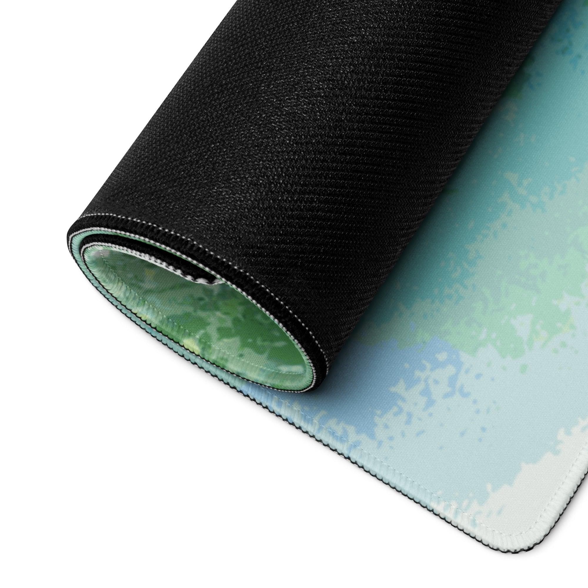Rolled watercolor forest gradient blue to green gaming mouse pad