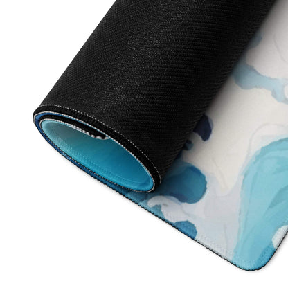 Rolled-up Stylized Ocean Wave blue gaming mouse pad with teal lining