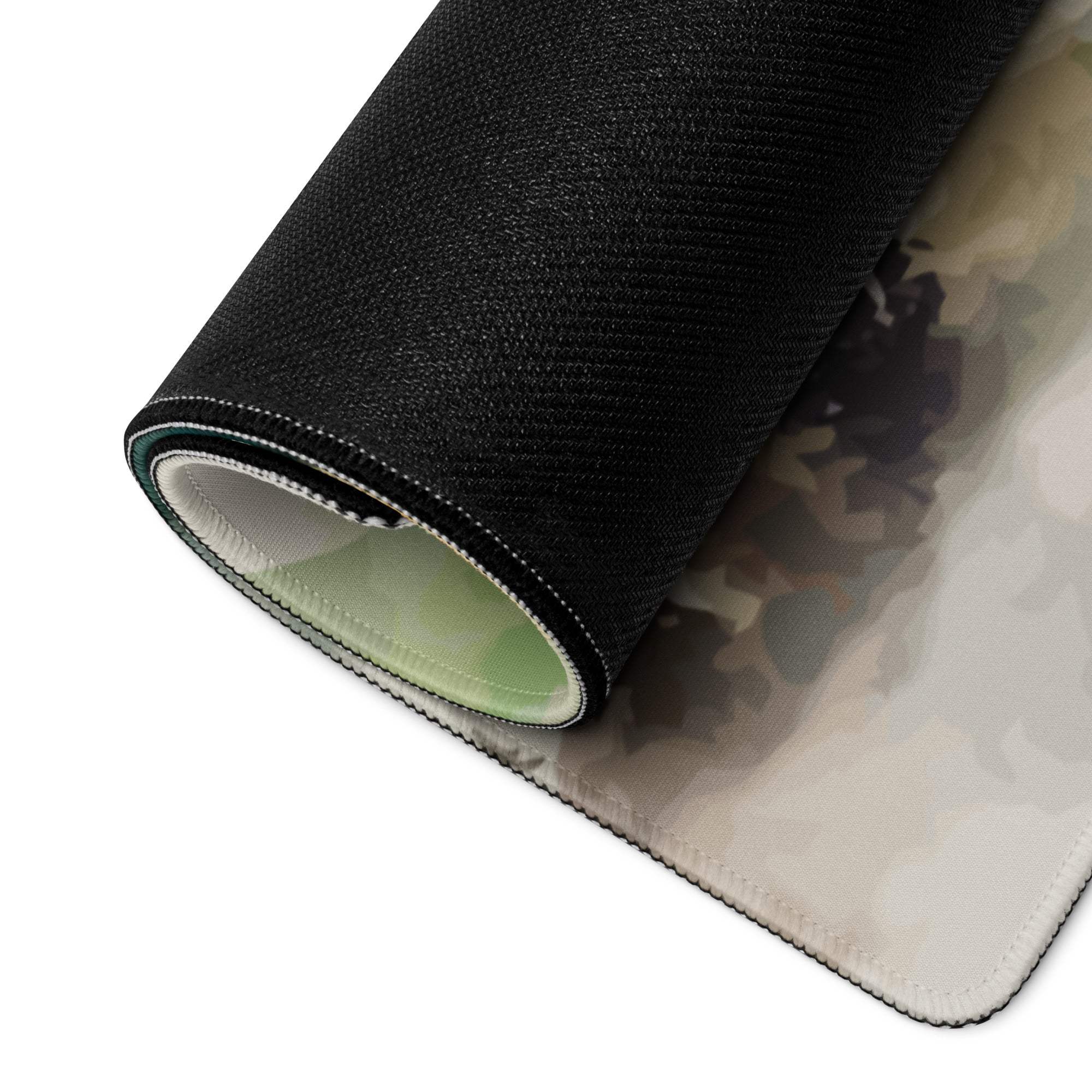 Back view of Watercolor Mountain gaming mouse pad with black camo non-slip underside and stitched edges