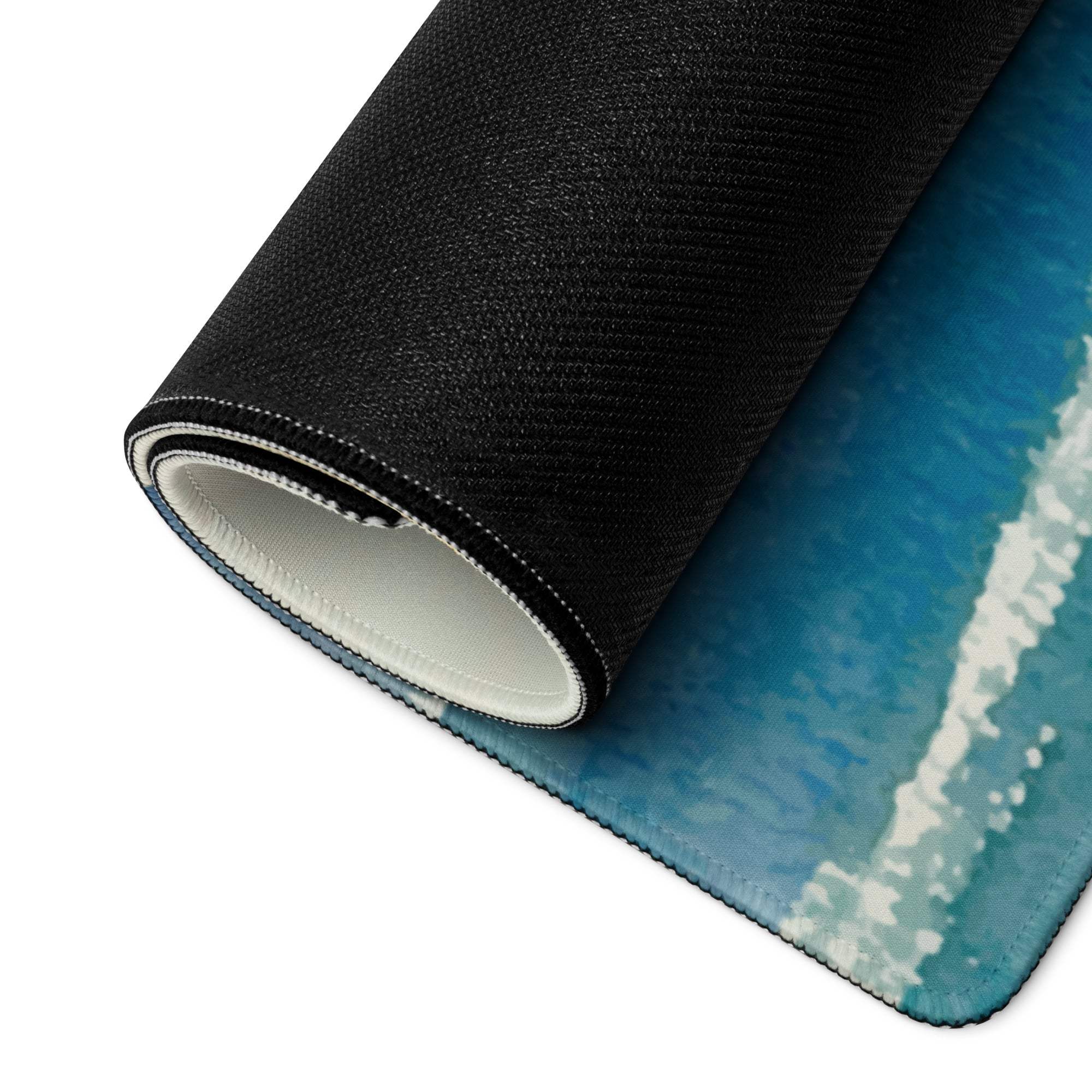 Black textured mousepad with vibrant blue watercolor ocean wave design