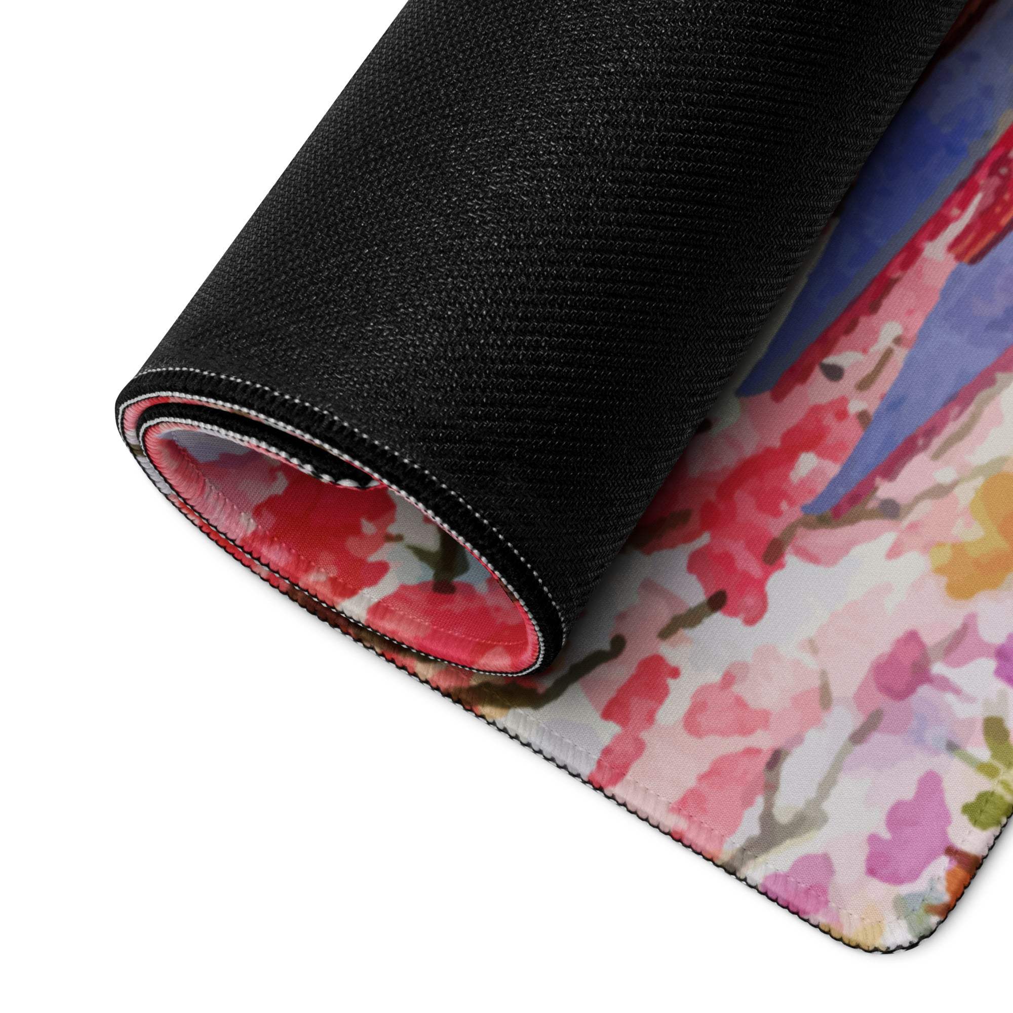 Rolled-up black artistic cherry blossom gaming mouse pad with Mount Fuji scene