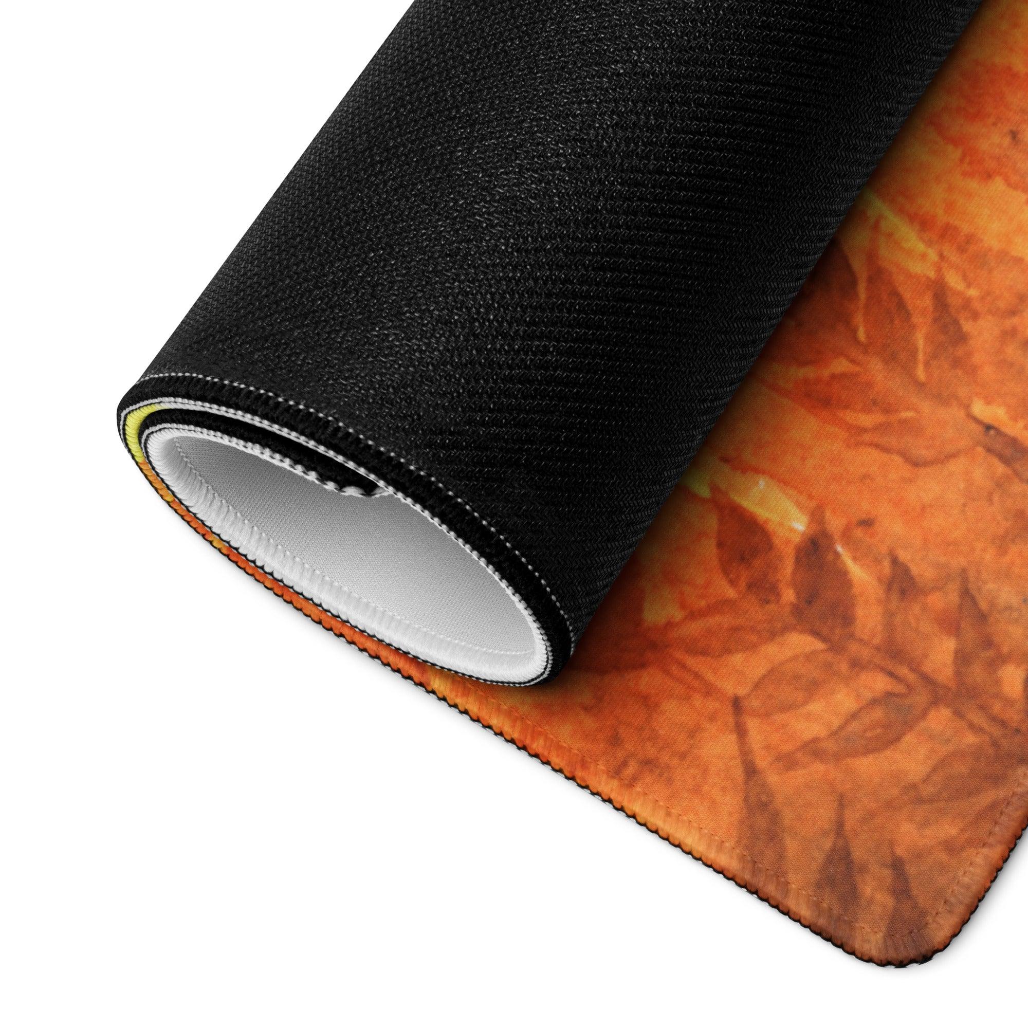 Rolled-up Autumn Leaves gaming mouse pad with orange brown leaf design