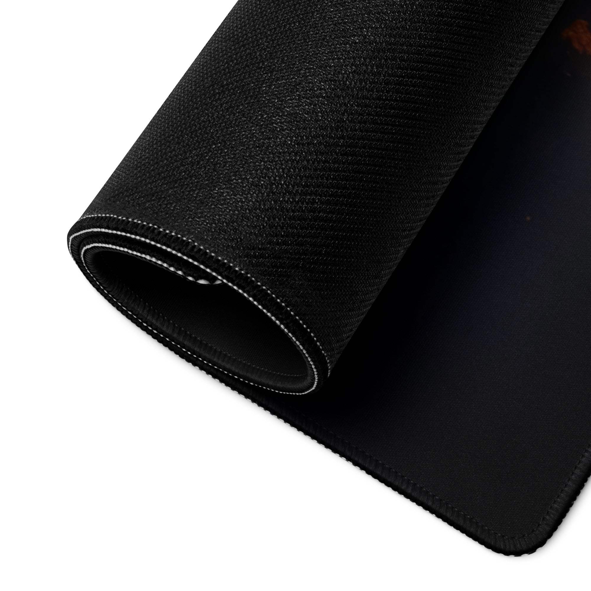 Black textured gaming mousepad with white stitched rolled edge, non-slip base