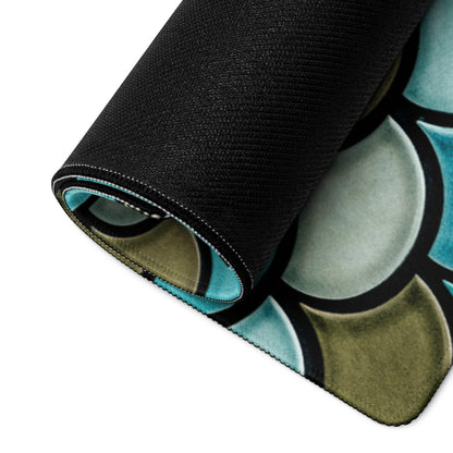 Rolled-up teal mermaid scale gaming mouse pad with non-slip base