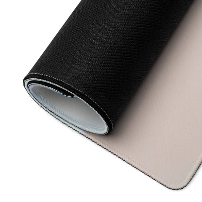 Back of black textured pastel geometric gaming mouse pad with beige non-slip underside and stitched edges