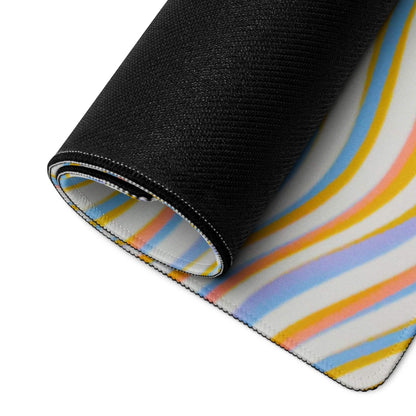Rolled-up vibrant wavy pastel stripe gaming mouse pad with non-slip base