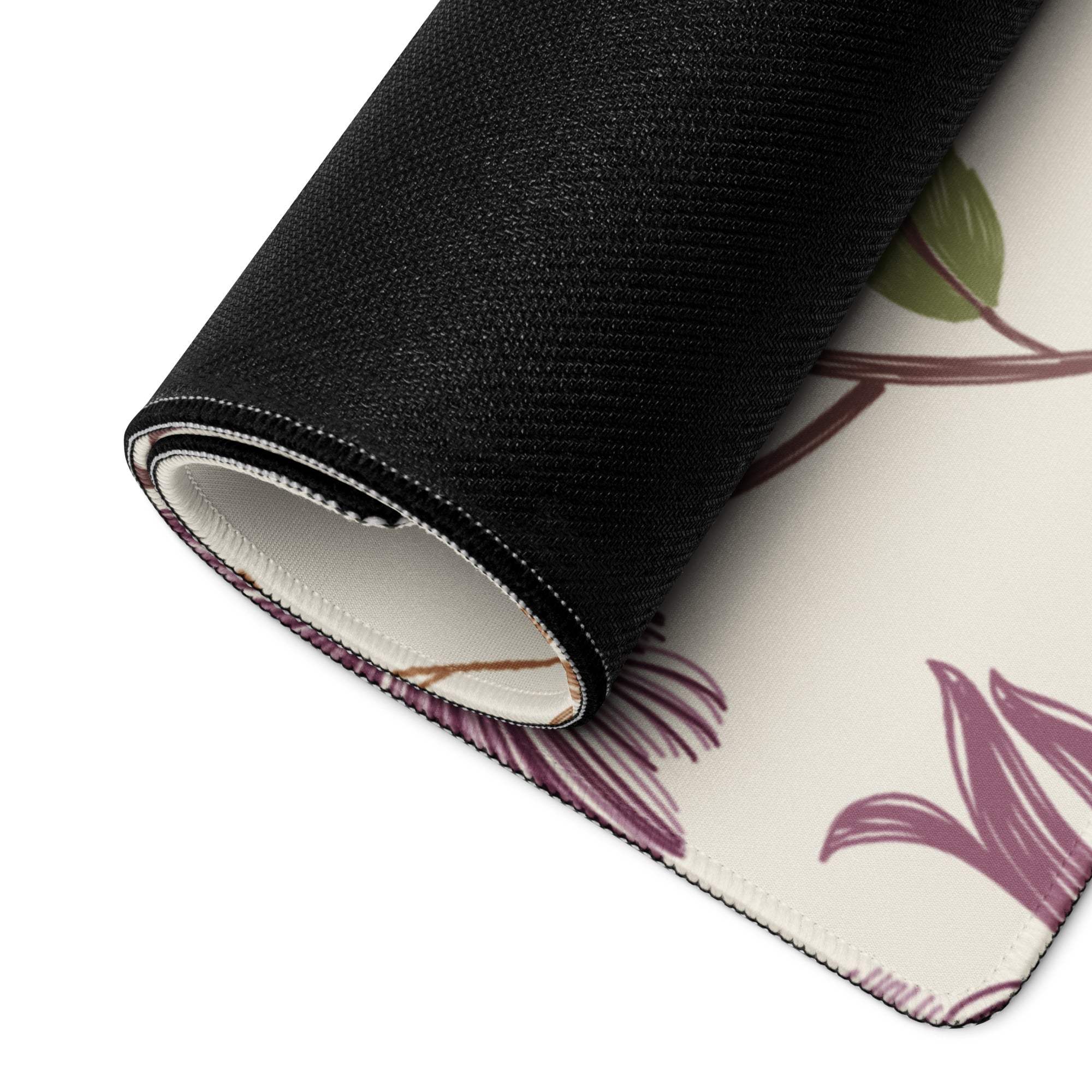 Rolled beige purple floral gaming mouse pad with non-slip base