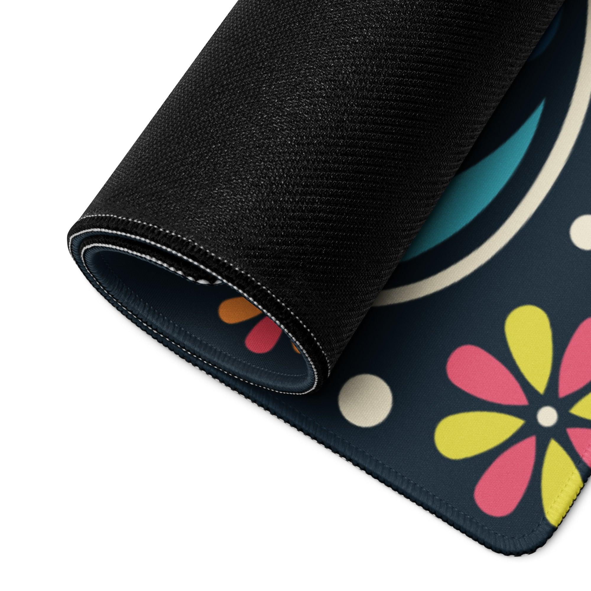 Rolled-up black floral gaming mouse pad with birds pattern