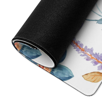 Rolled-up large floral watercolor gaming mouse pad with lavender sprigs