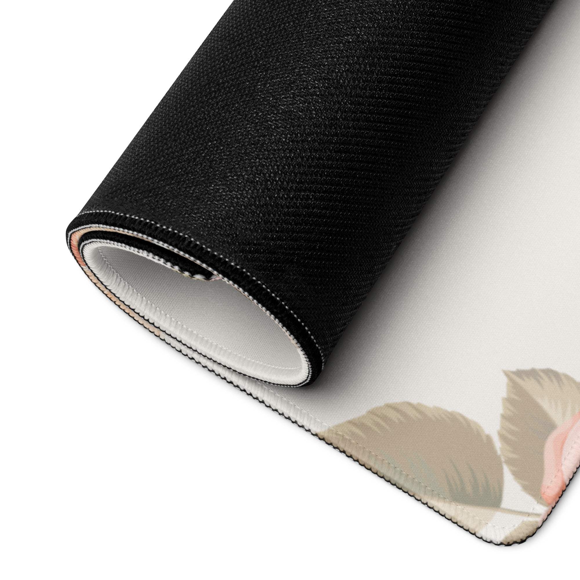 Black and white floral mousepad with textured surface and stitched edges