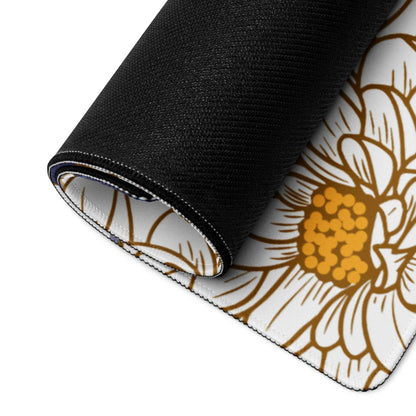 Rolled-up large gaming desk mat with elegant white gold floral design