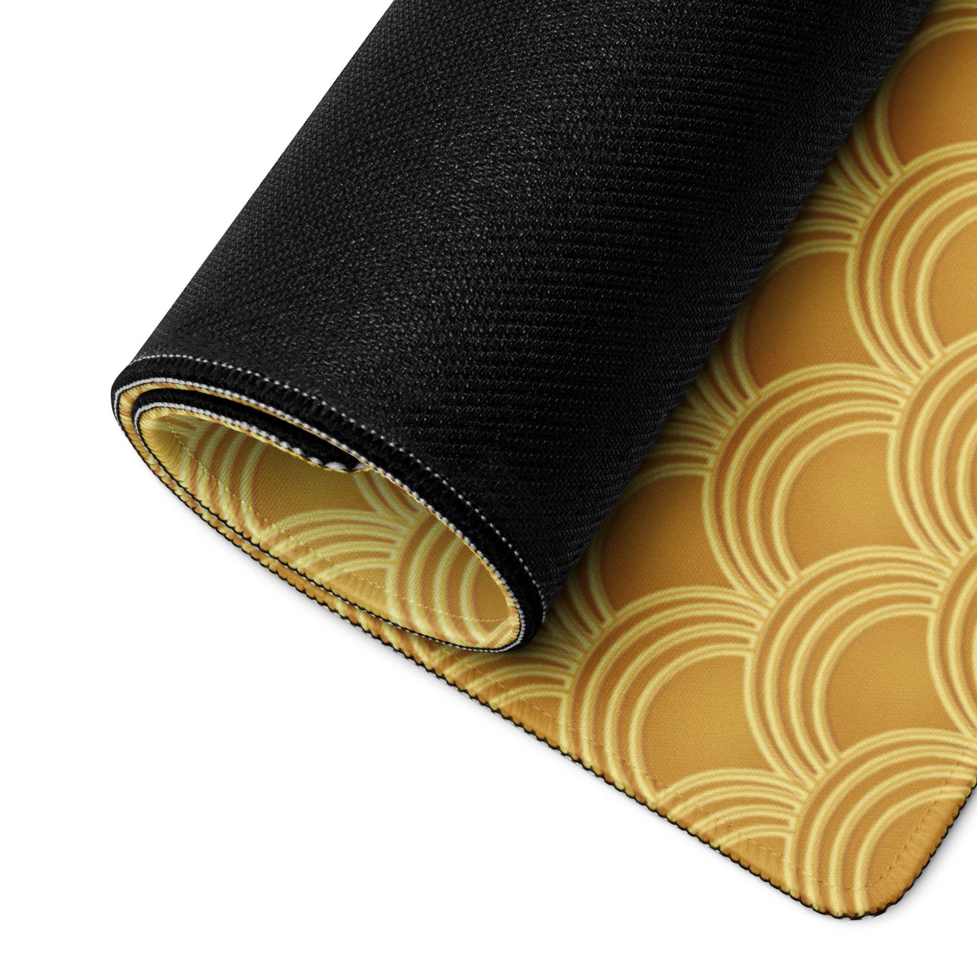 Black and gold wave-patterned gaming mouse pad with scallop texture