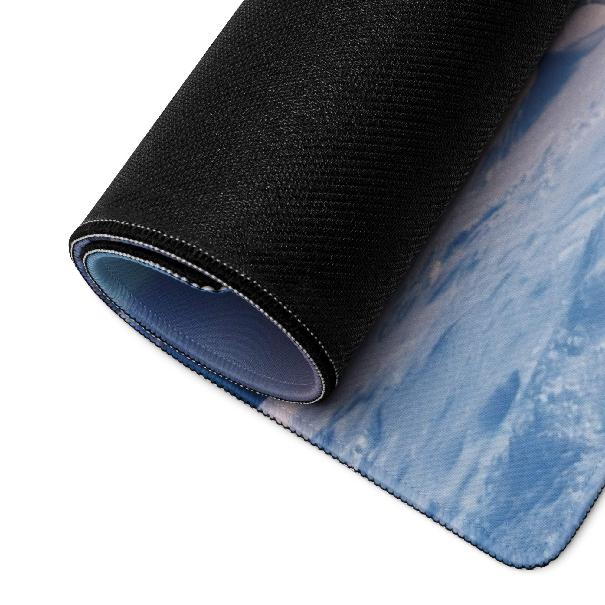 Black textured mousepad with blue white snowy Winter Forest mountain landscape
