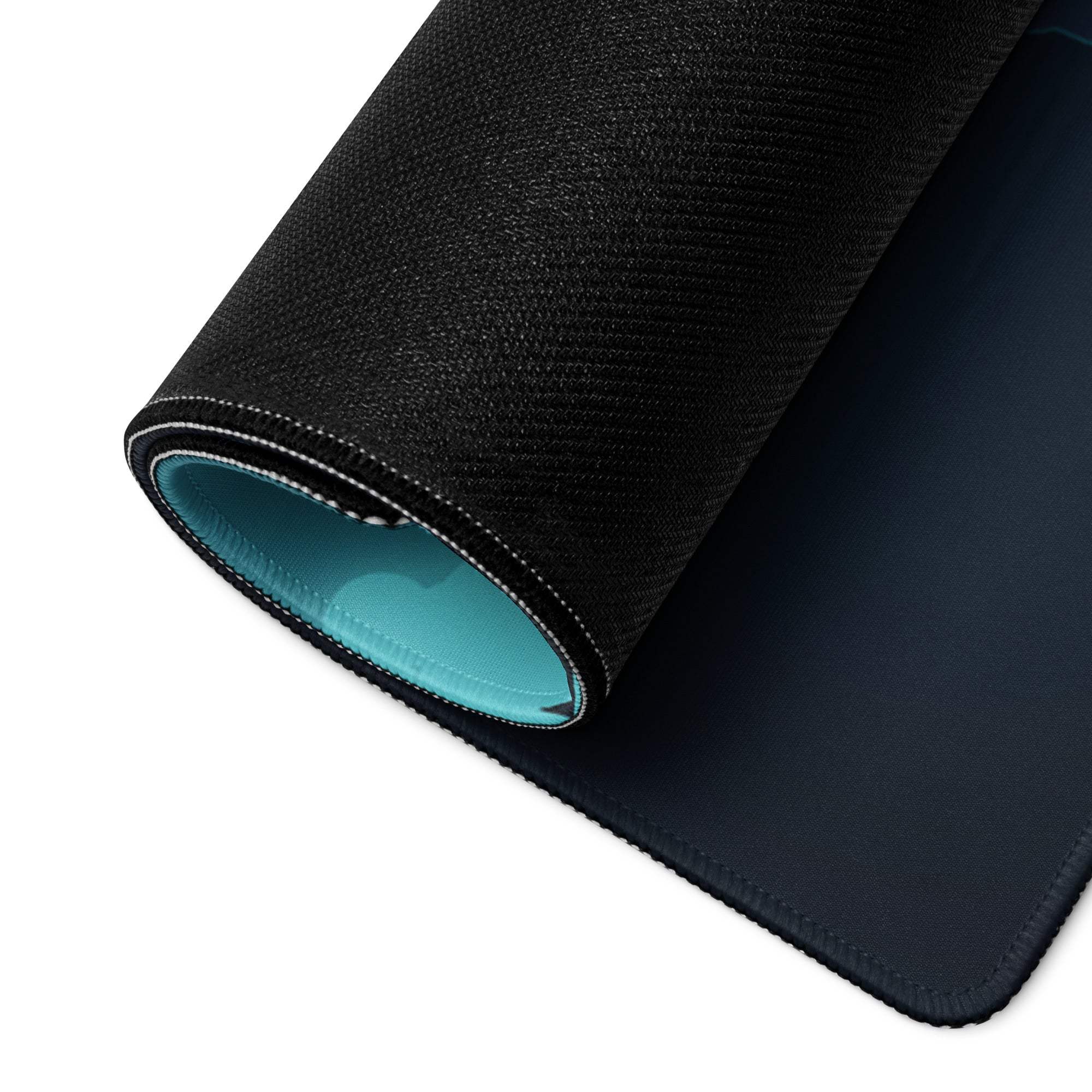 Black textured Epic Aurora gaming mousepad with teal lining and stitched edges
