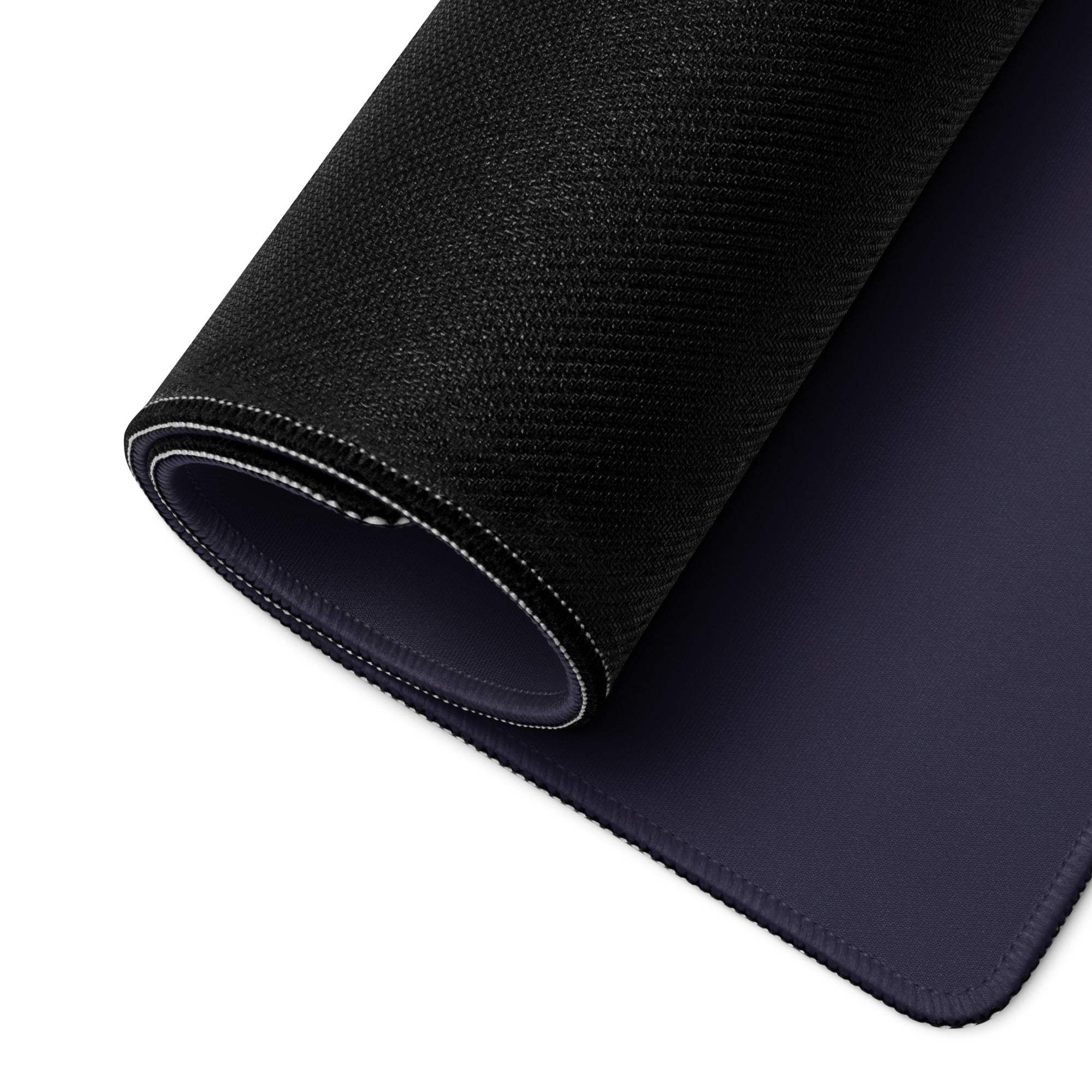 Back of stylized wolf sunset gaming mouse pad with black textured top navy underside reinforced edges