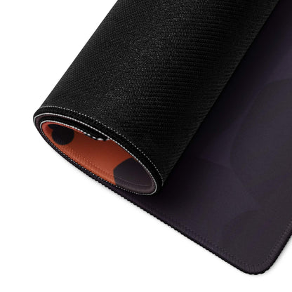 Black textured gaming mousepad with sunset gradient, orange lining, non-slip stitching