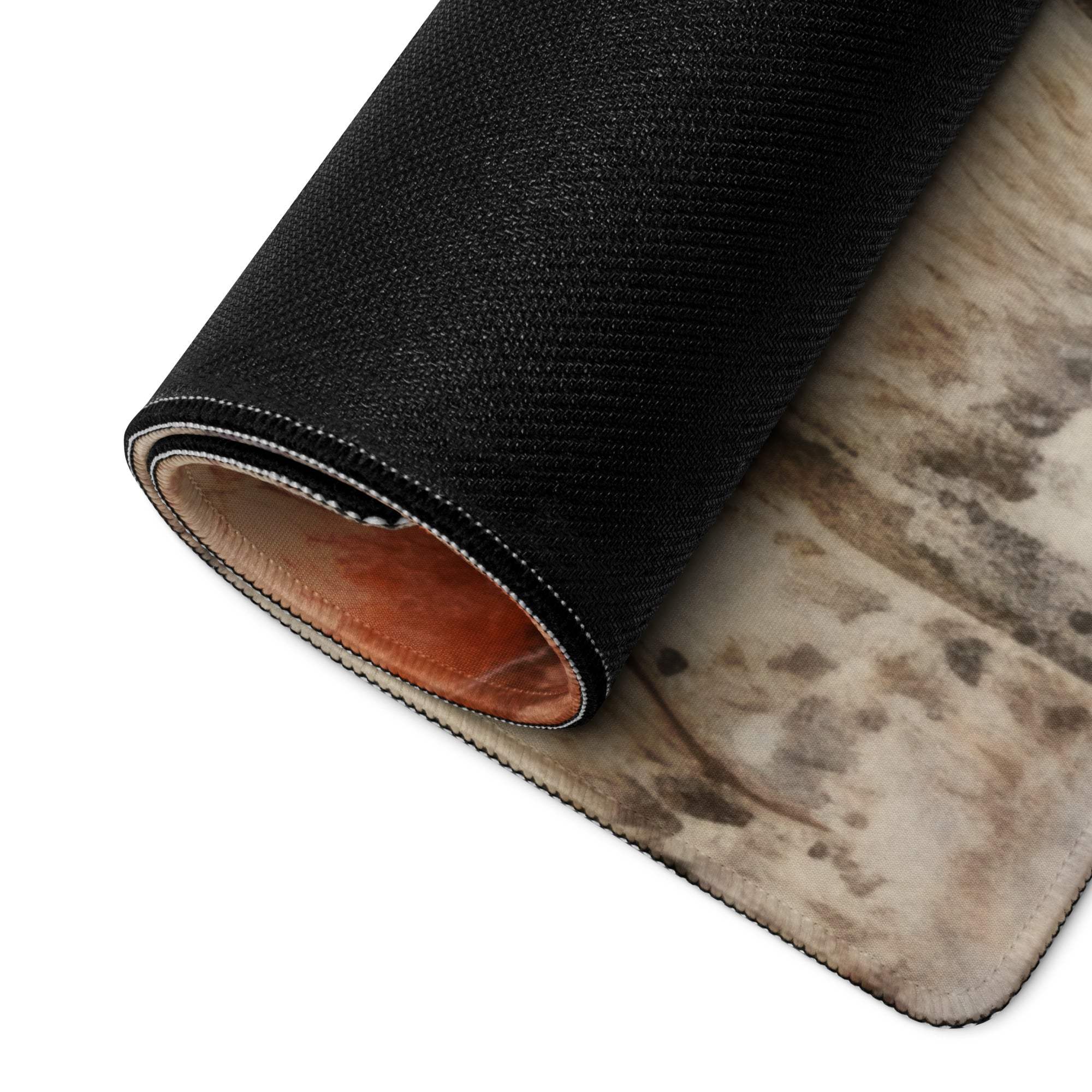 Black textured marble rug with stitched edges on large gaming mouse pad