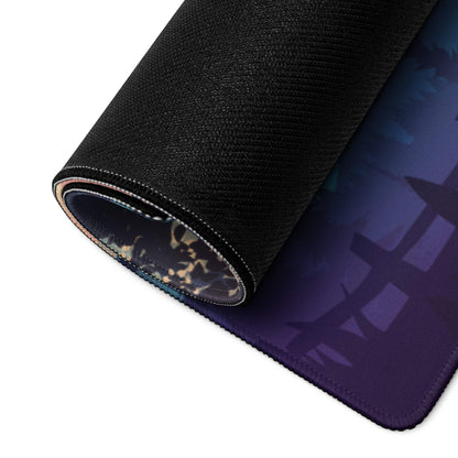 Rolled-up Serene Mountain Sunset gaming mousepad with purple-blue gradient silhouettes