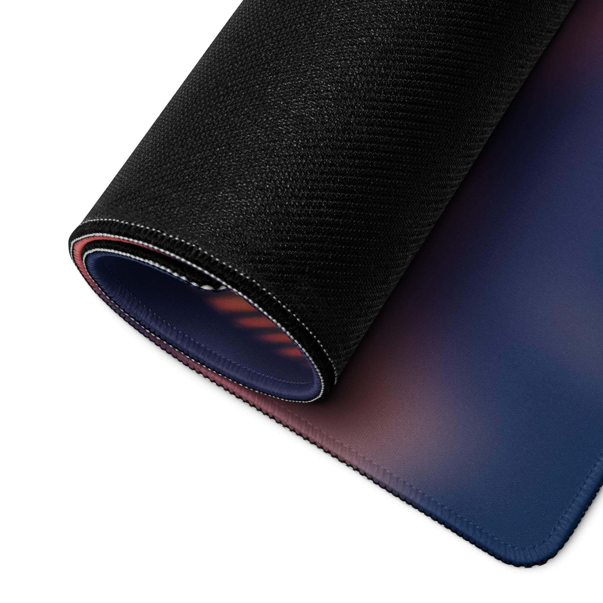 Black textured Tropical Sunset gaming mousepad with blue-purple gradient, rolled edge