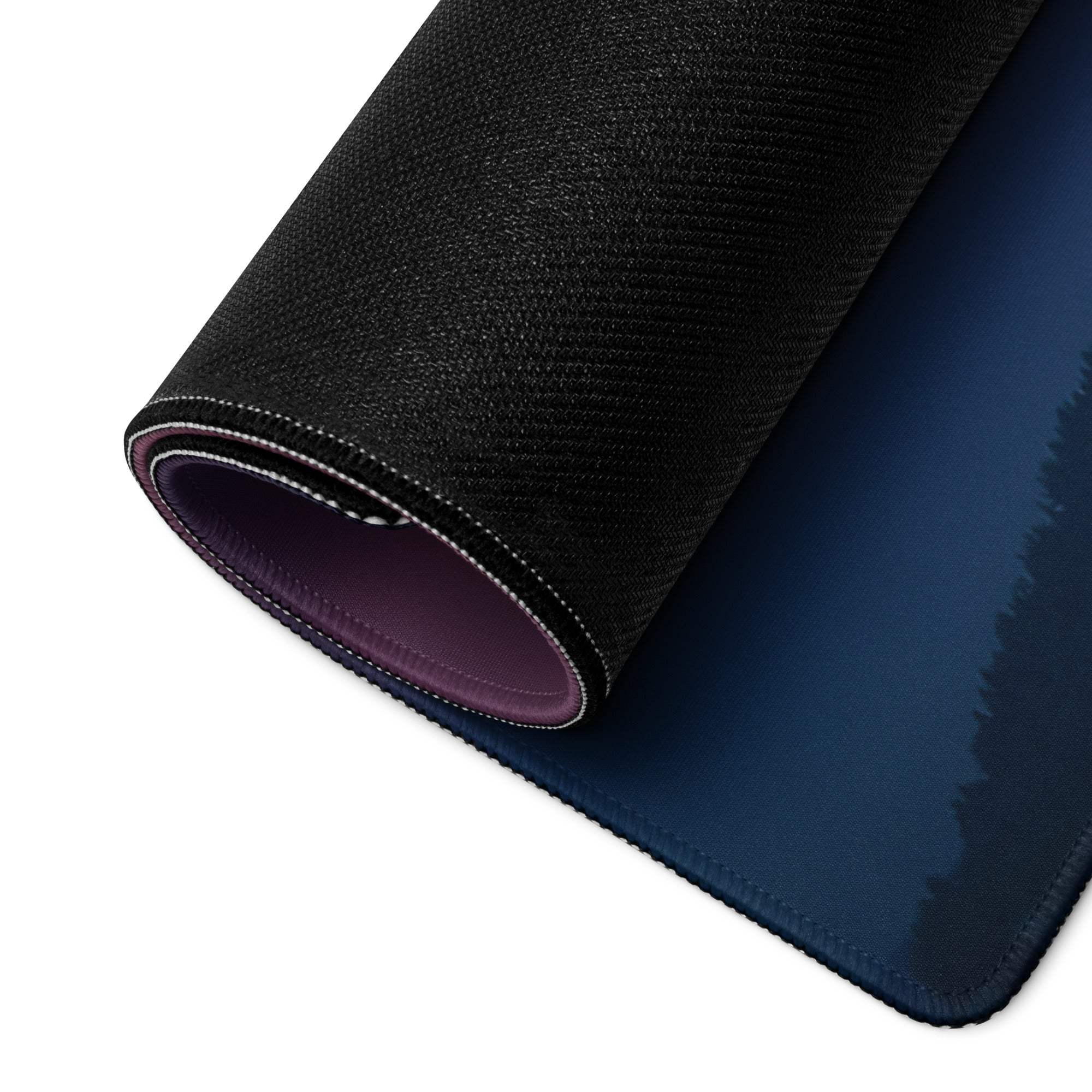 Black textured mousepad with deep blue gradient, purple lining and orange sunset design