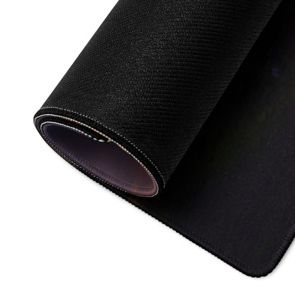 Black textured gaming mousepad with stitched edges, non-slip base