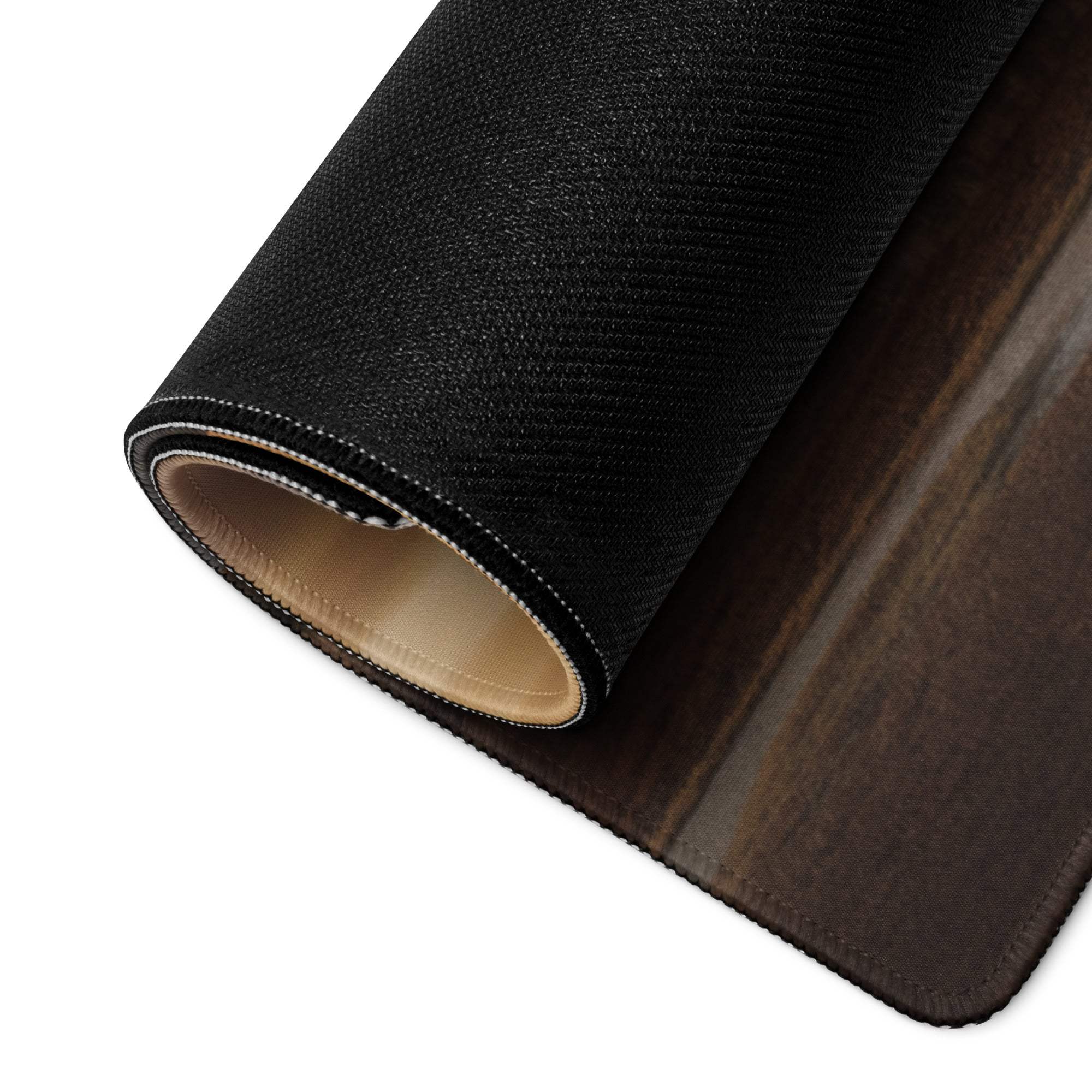 Back of Sunset Mountain extra large gaming mouse pad with black textured wood-grain design