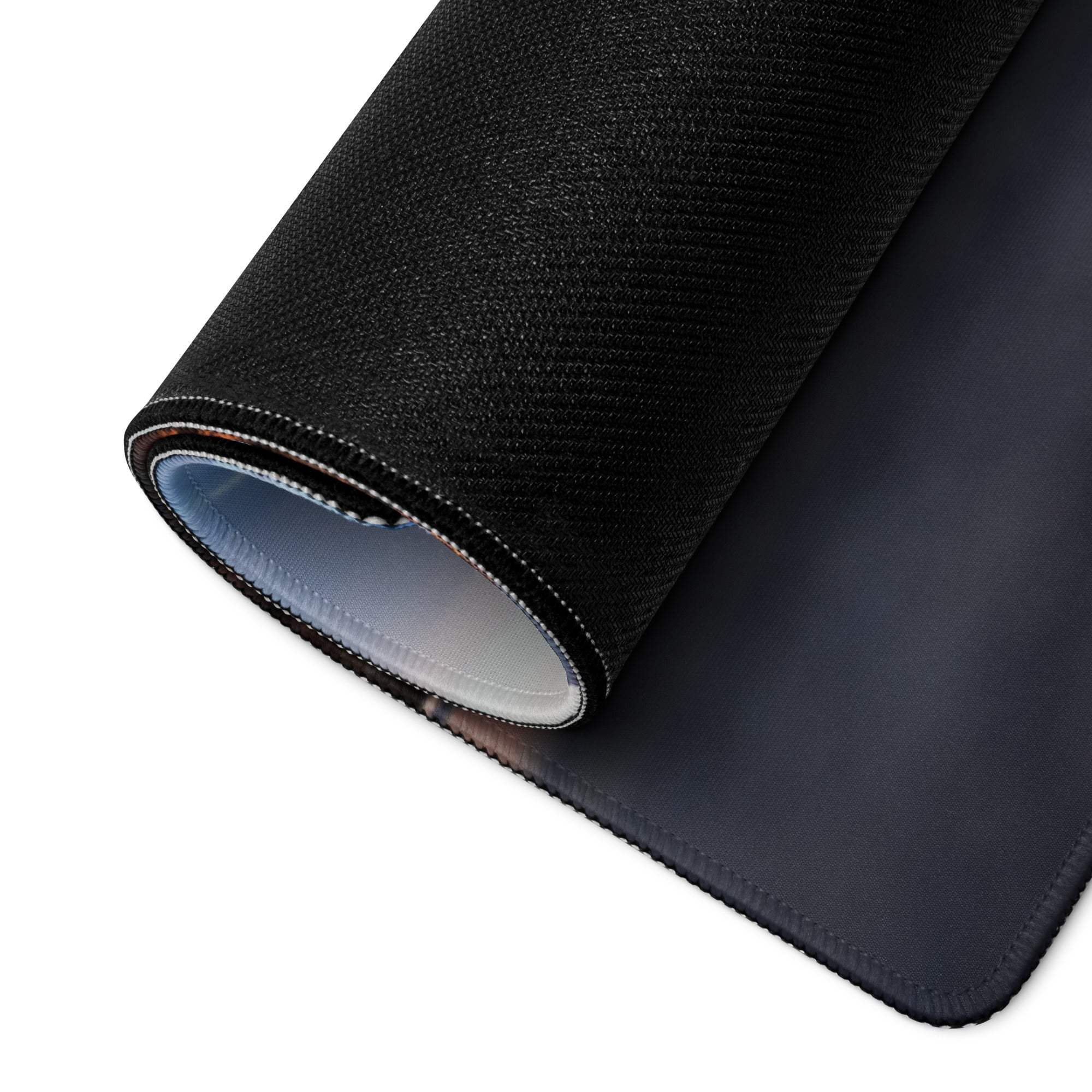 Black textured Desert Sunset Monument Valley mousepad with rolled edge and light blue lining