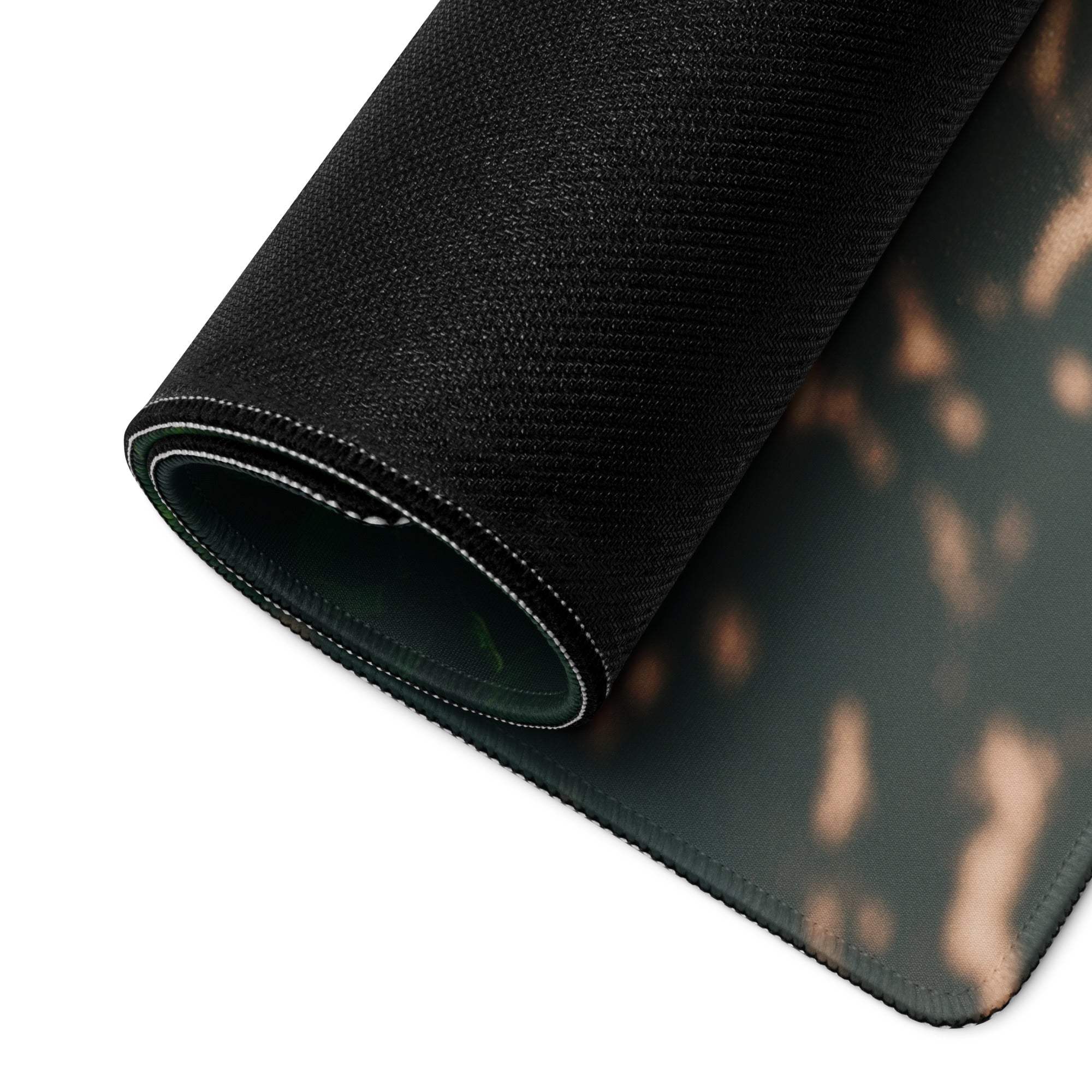 Black textured camo mousepad with stitched edges, ocean teal gaming