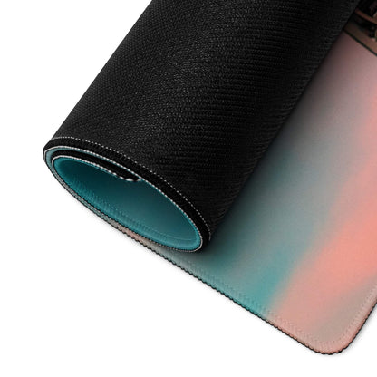 Rolled-up Dreamy Sunset Ferris Wheel gaming mouse pad, teal-to-pink gradient, non-slip base