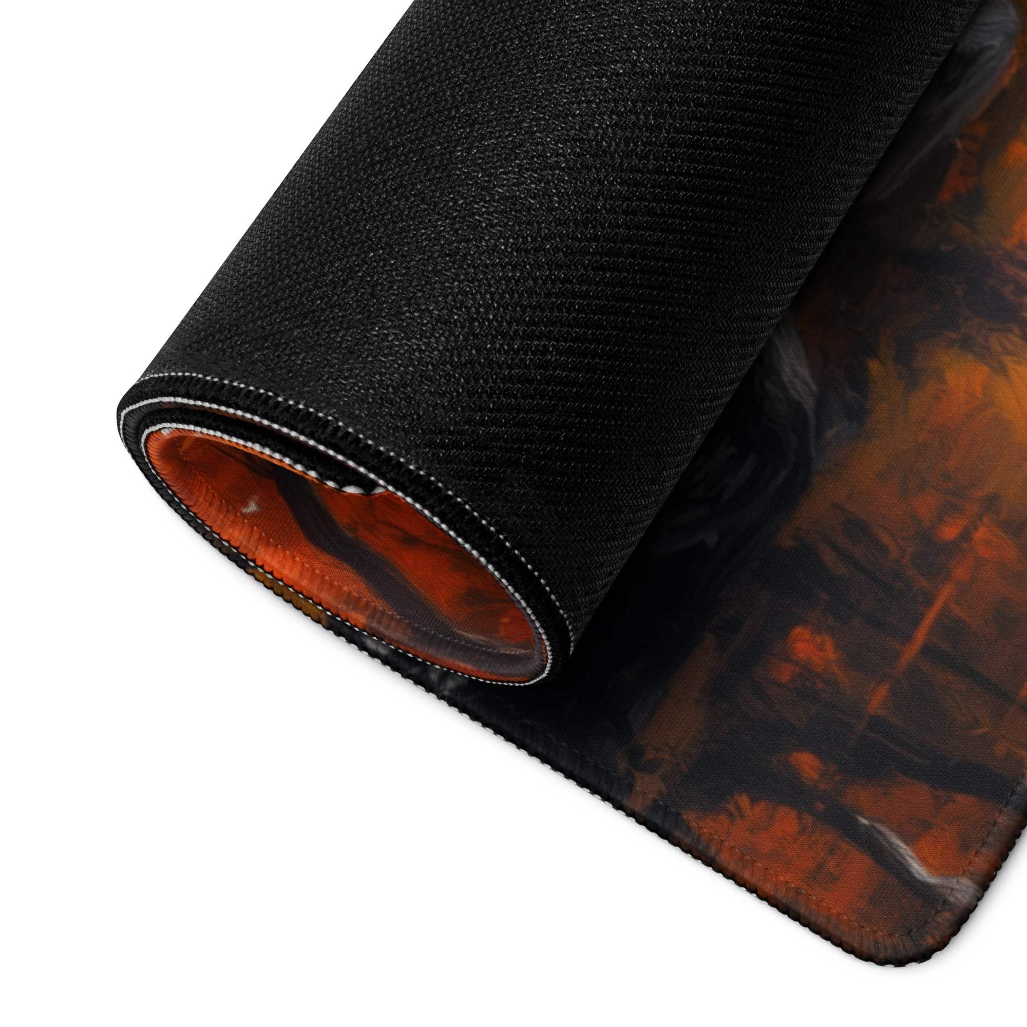 Black gaming mousepad with fiery orange autumn landscape design