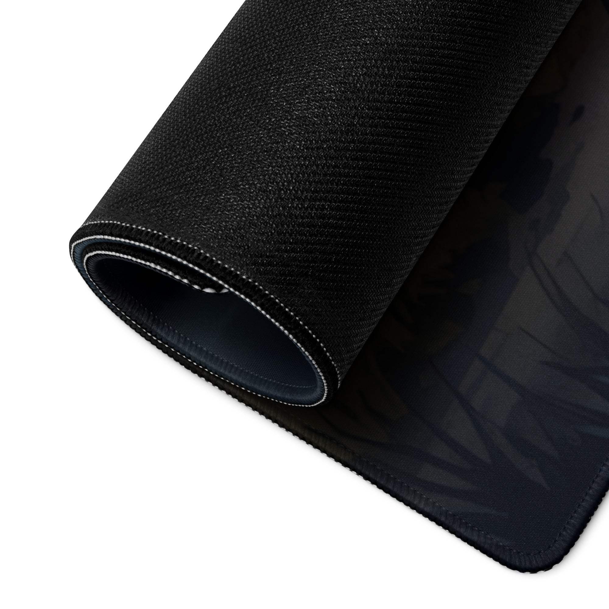 Black textured gaming mousepad with night forest campfire design and stitched edges