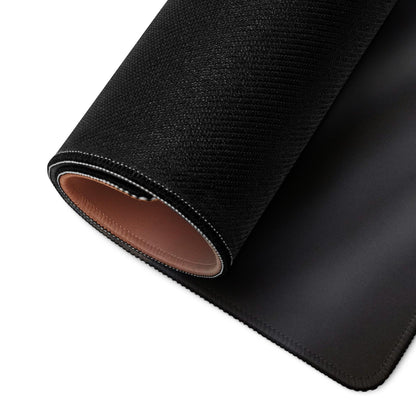 Black textured gaming mousepad with tan lining, matte finish and non-slip base
