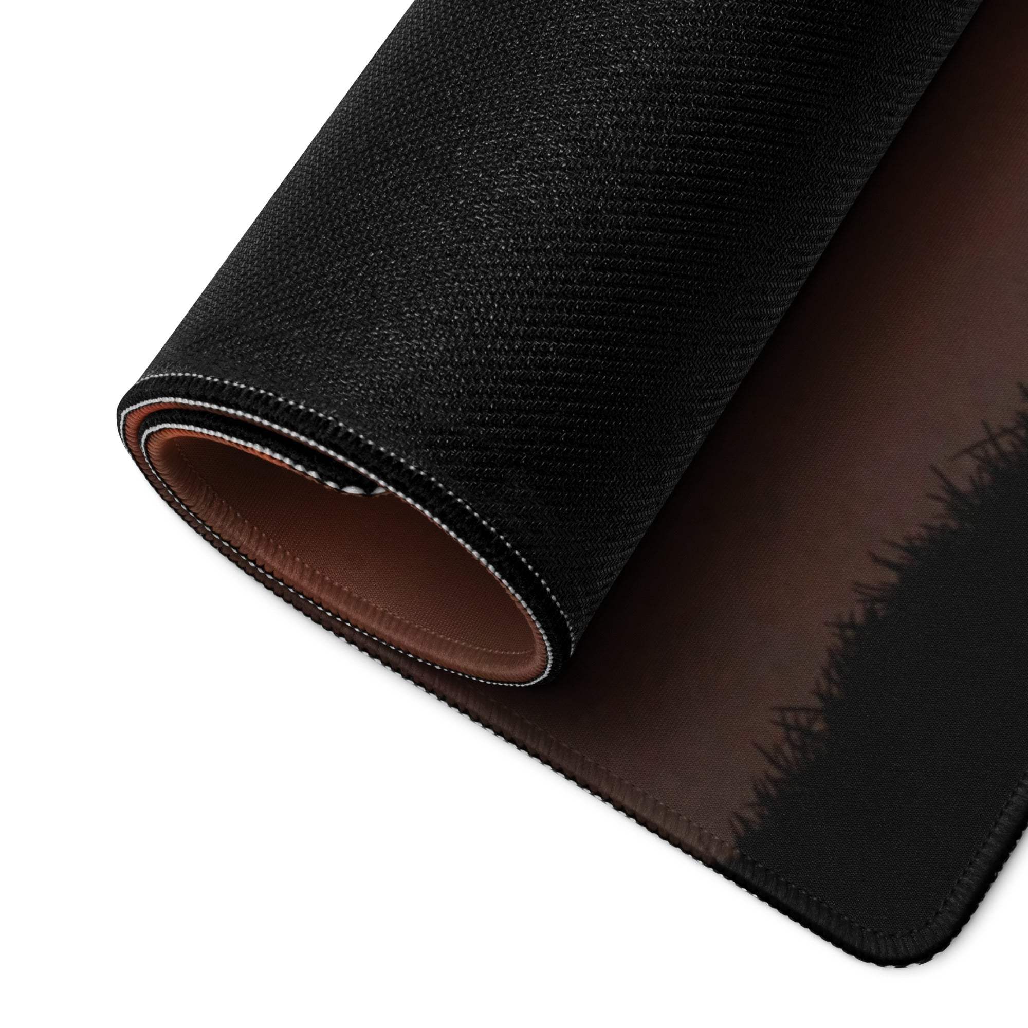 Black textured gaming mousepad back with brown underside, stitched edges, rolled