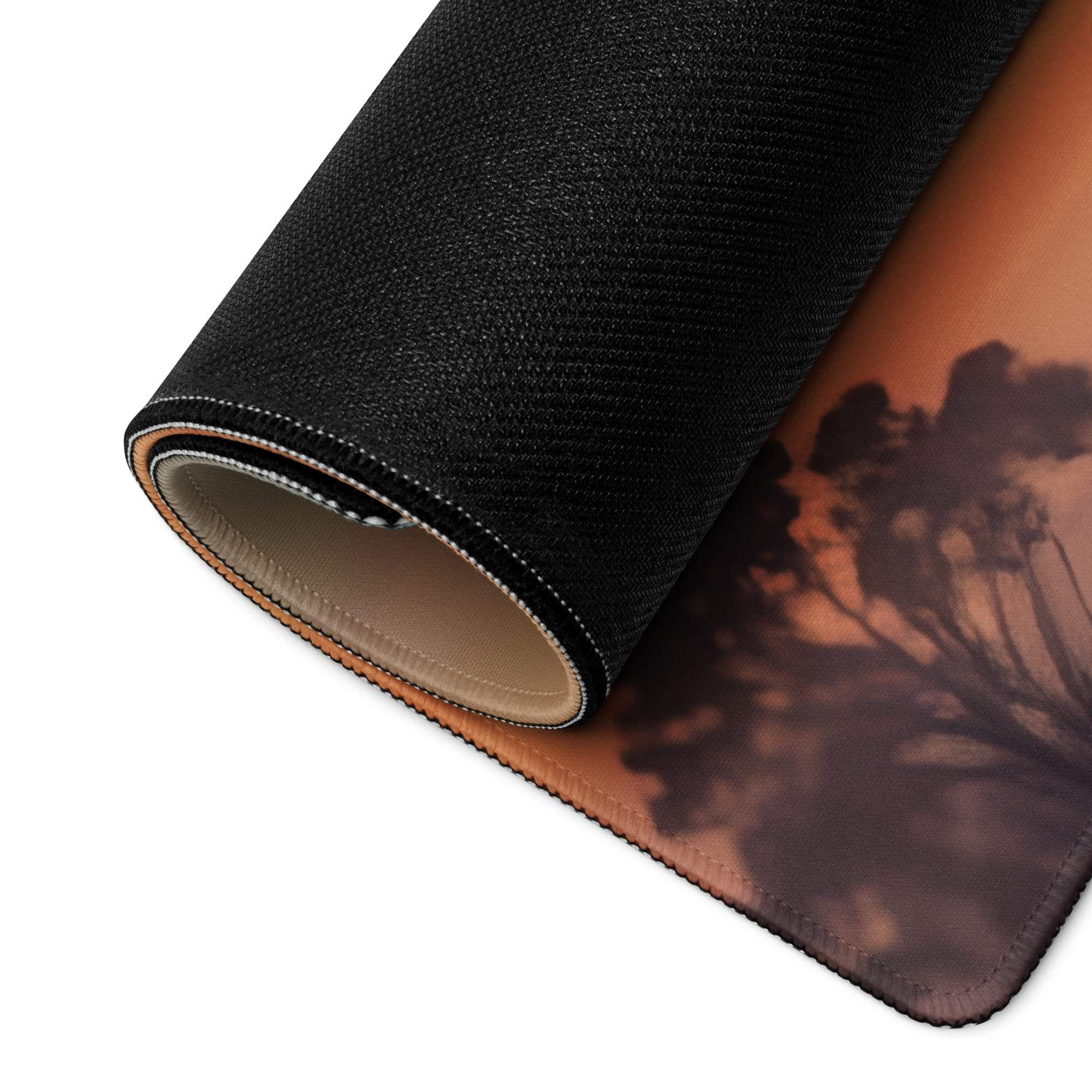 Black textured mousepad rolled edge with orange brown tree silhouette
