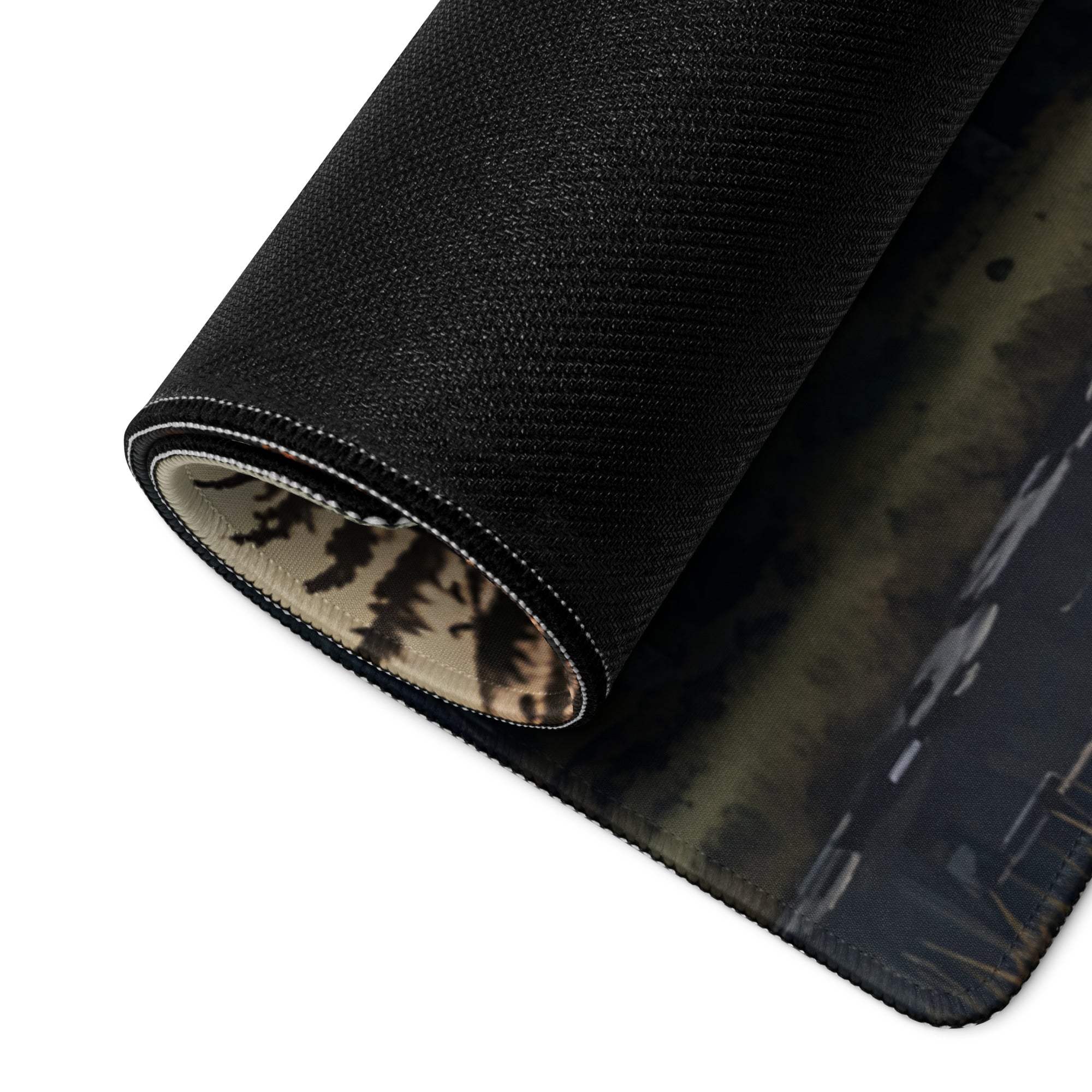 Black textured forest mousepad rolled to show non-slip base underside