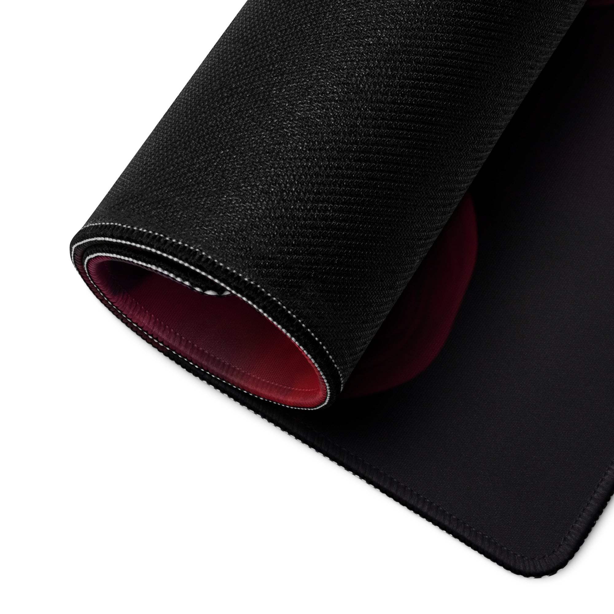 Premium ultra wide gaming mouse pad with black texture, vivid red interior, white stitching