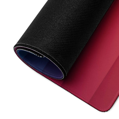 Black and red gaming mousepad with stitched edges, blue lining, non-slip base
