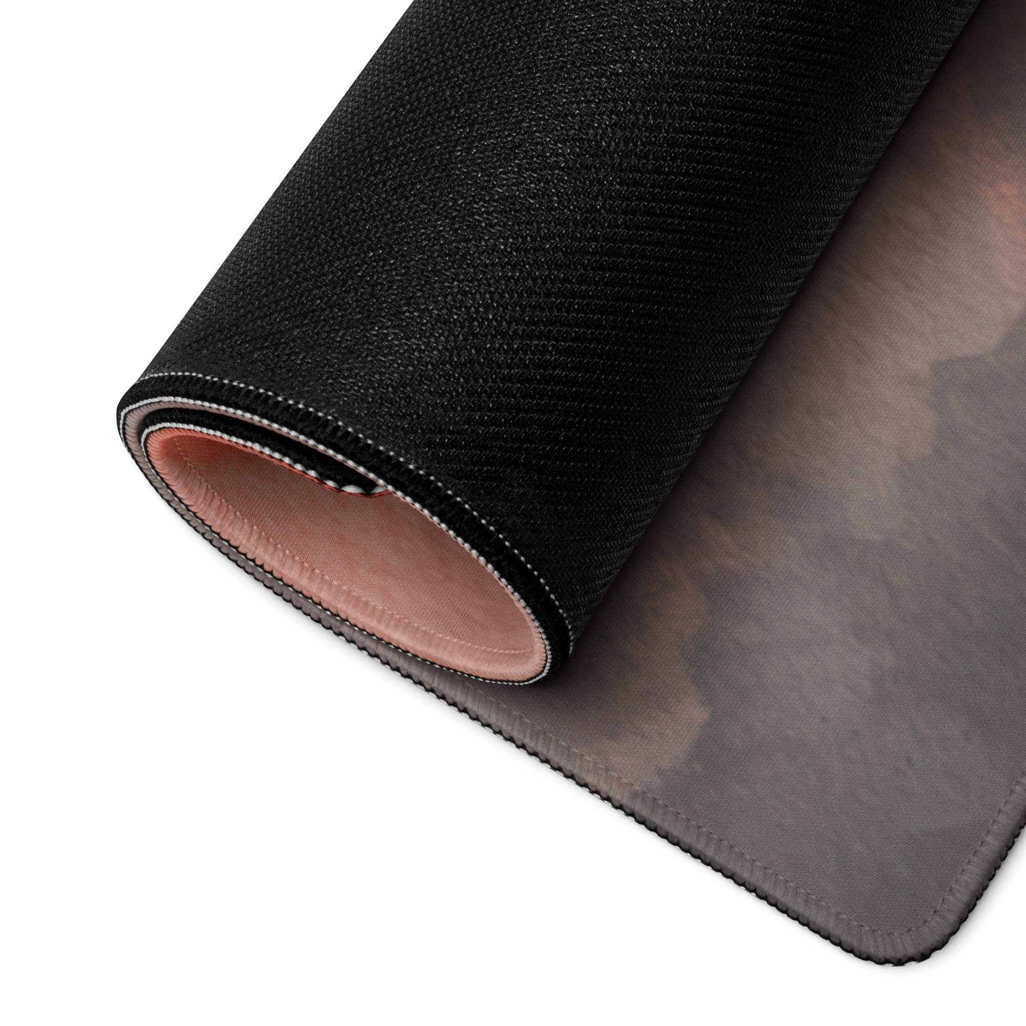 Black textured gaming mousepad with neon sunset gradient, stitched edges