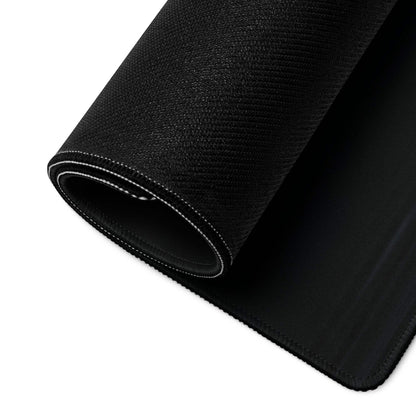 Black textured gaming mousepad with white stitched rolled edge, non-slip base