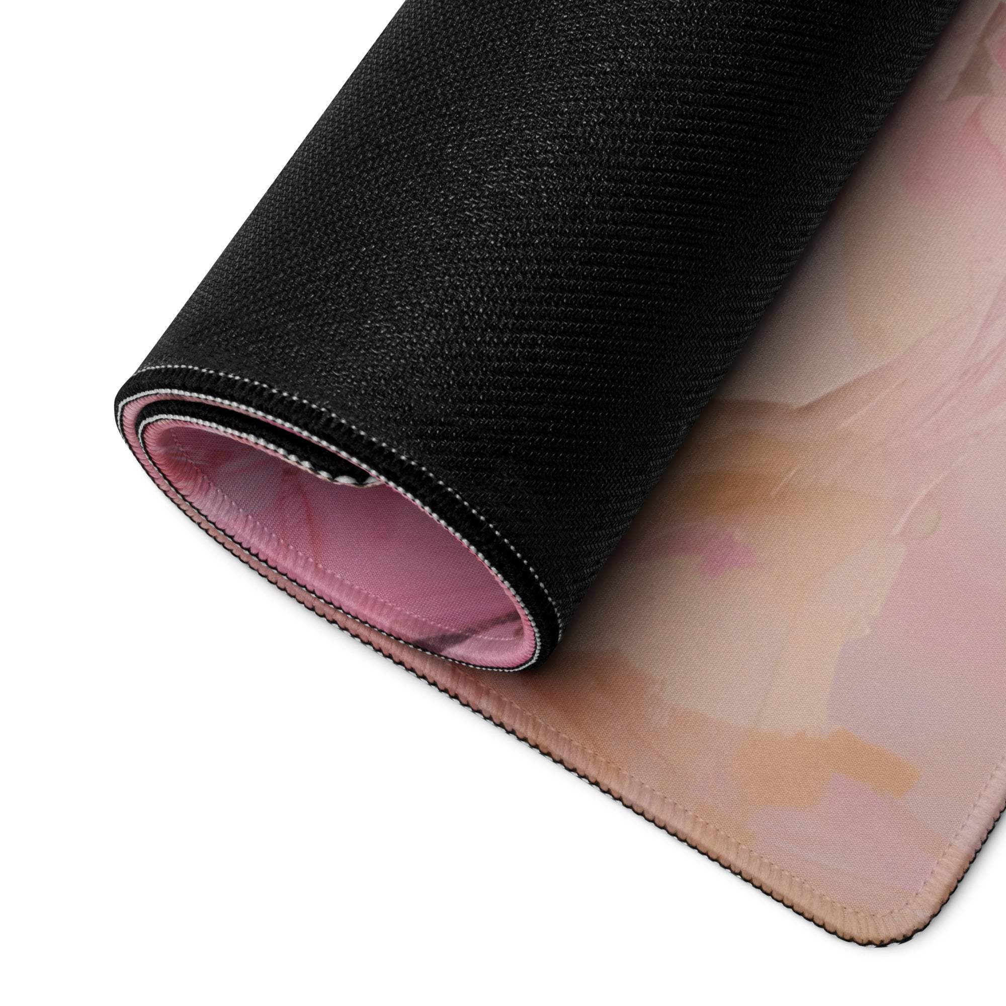 Rolled elegant floral pink gaming mouse pad with pink lining and watercolor design