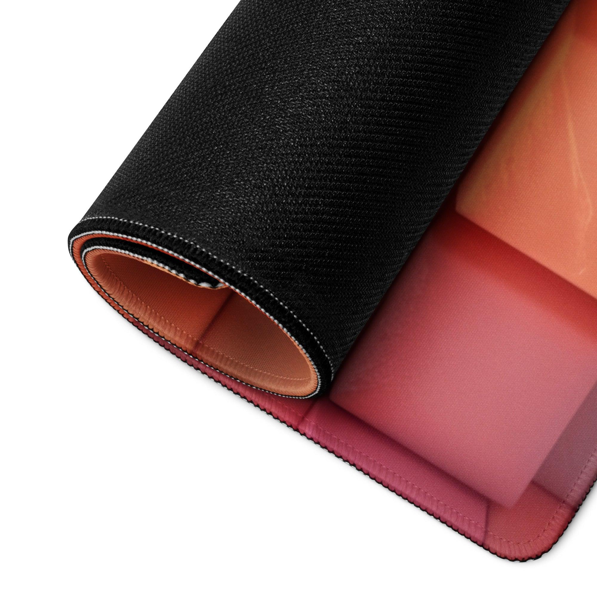 Black textured mousepad with tan interior, pink padding, rainbow cube pattern