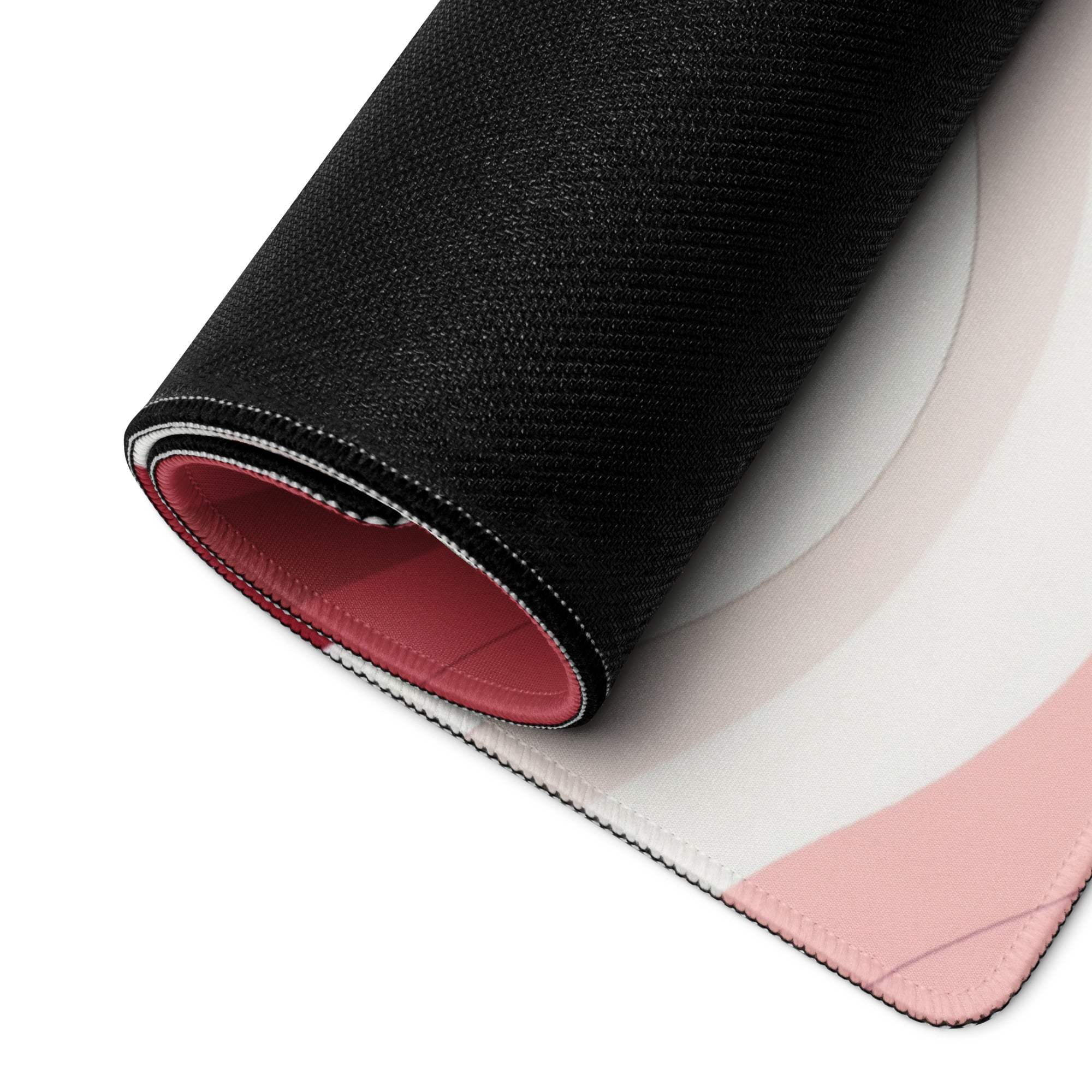 Rolled-up Vibrant Crimson Rose Wave gaming mouse pad with non-slip base