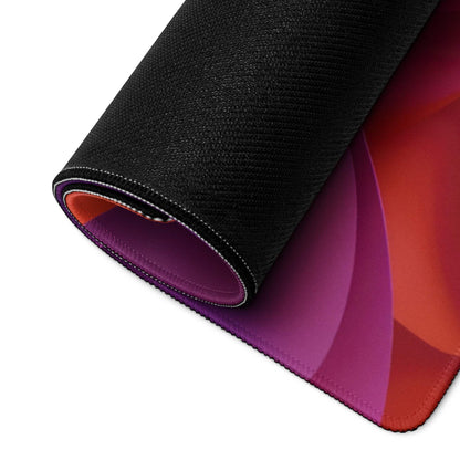 Underside of vibrant abstract floral orange purple gaming mouse pad with black textured non-slip base