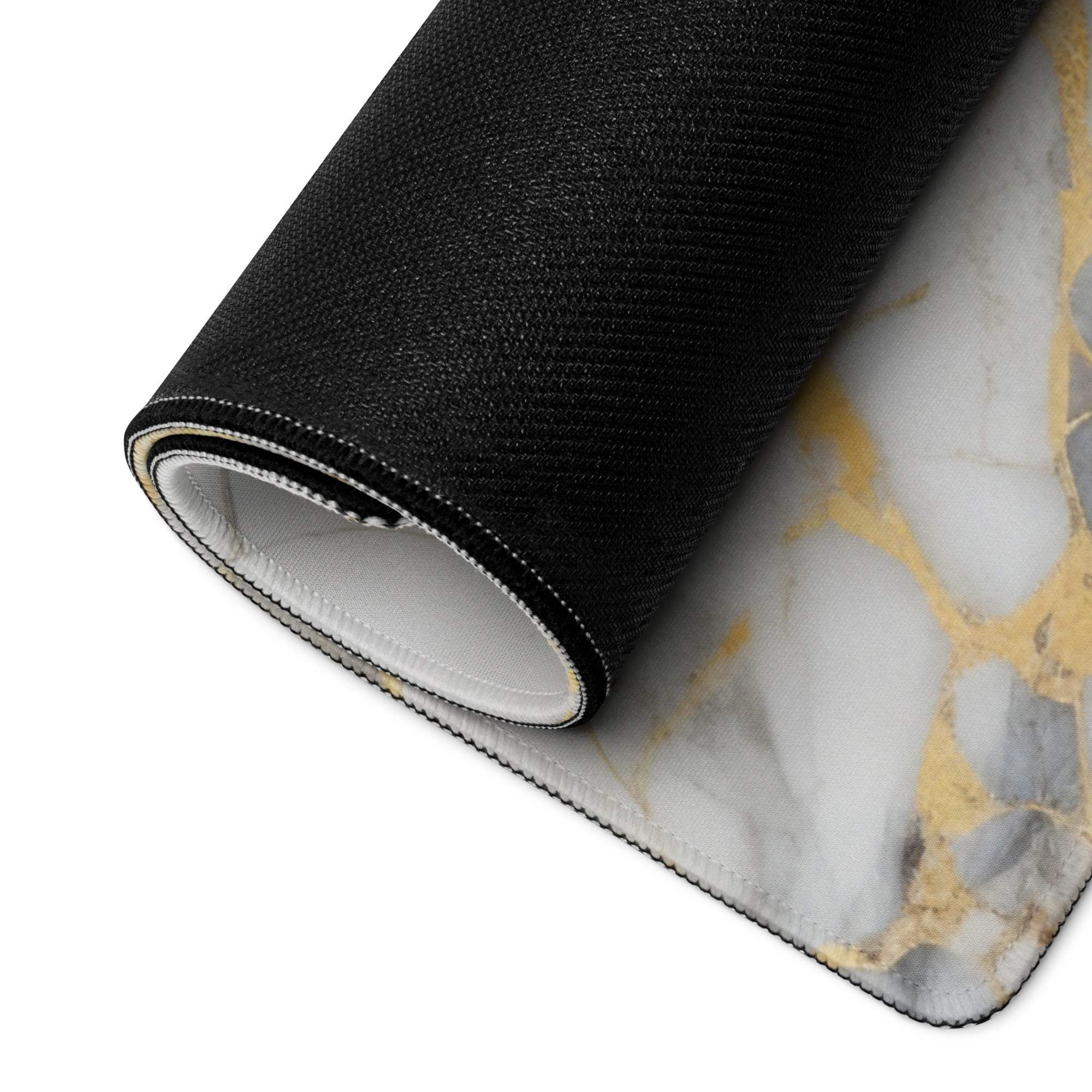 Black and white marble gaming mousepad with gold veins, textured black edge
