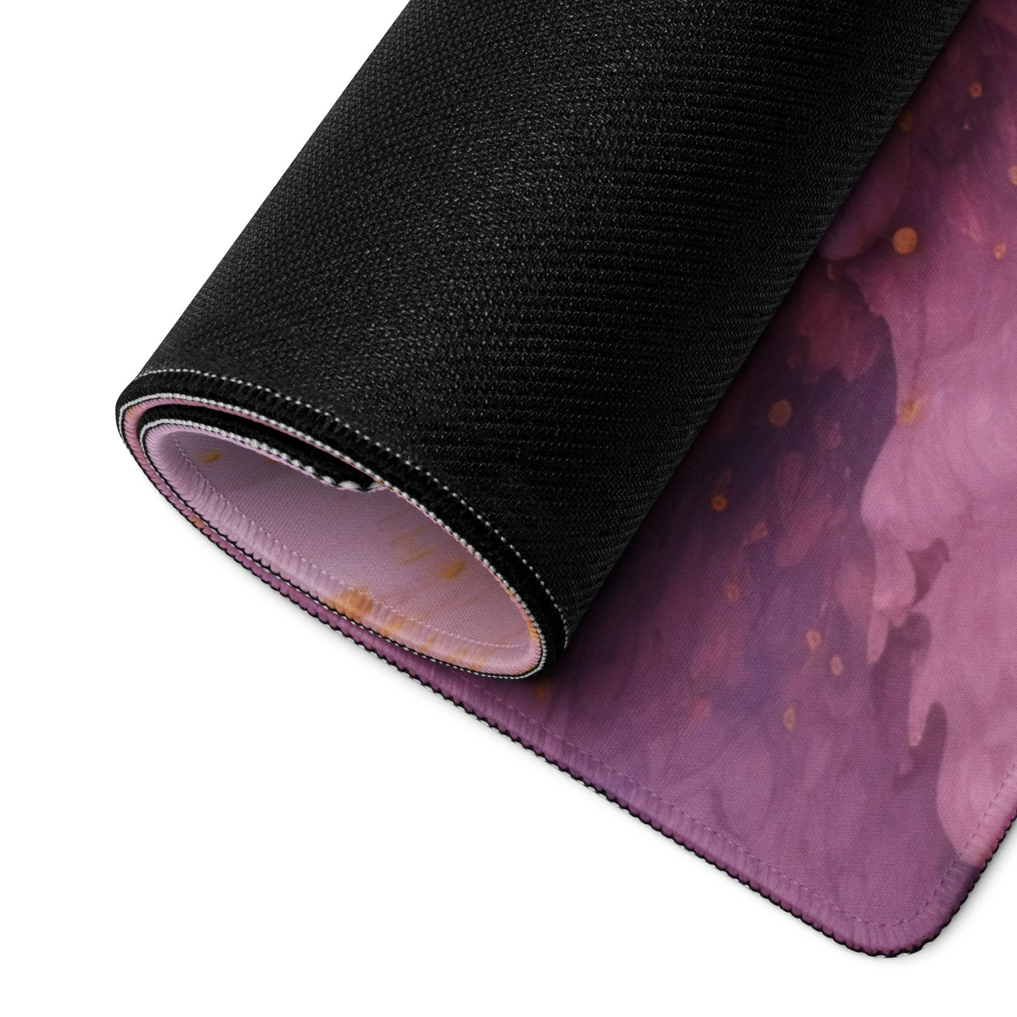 Rolled-up premium pink purple cosmic gaming mouse pad with non-slip base
