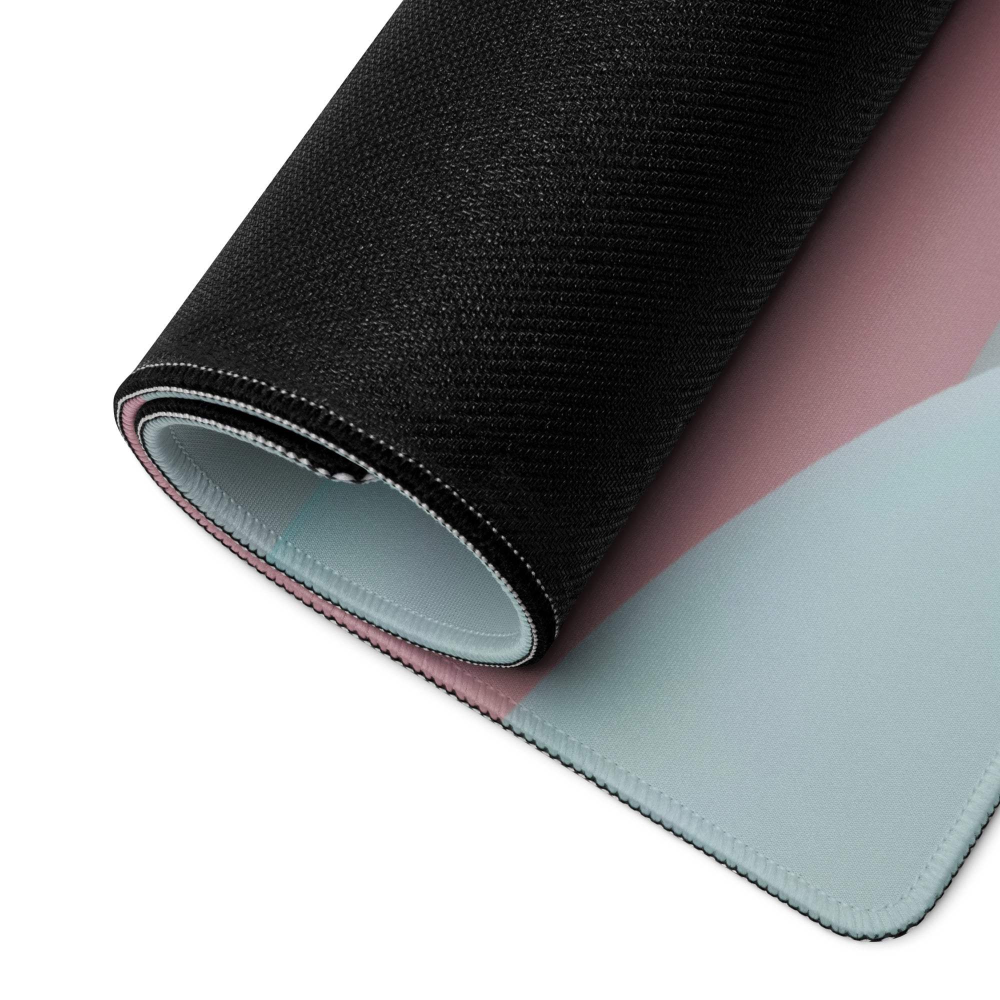 Black textured back of Pastel Planet Scene gaming mouse pad with pink-blue gradient