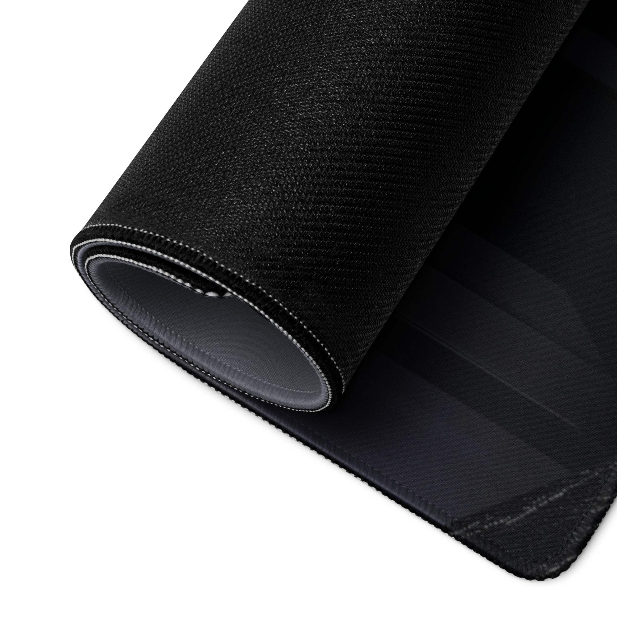 Black textured large gaming mousepad with stitched edges and non-slip base