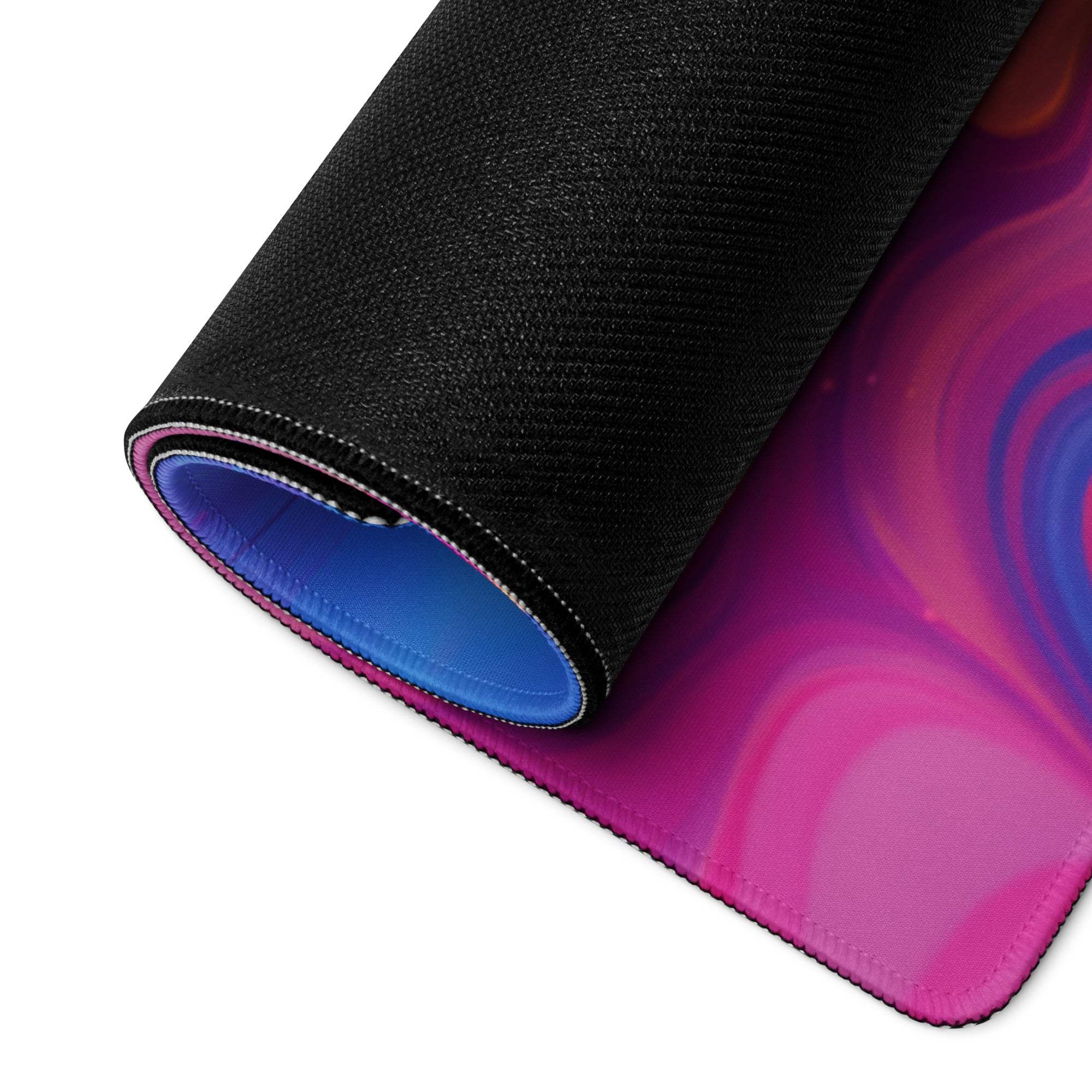 Abstract vibrant swirl gaming mouse pad with pink purple gradient, non-slip base, edge stitching, large size